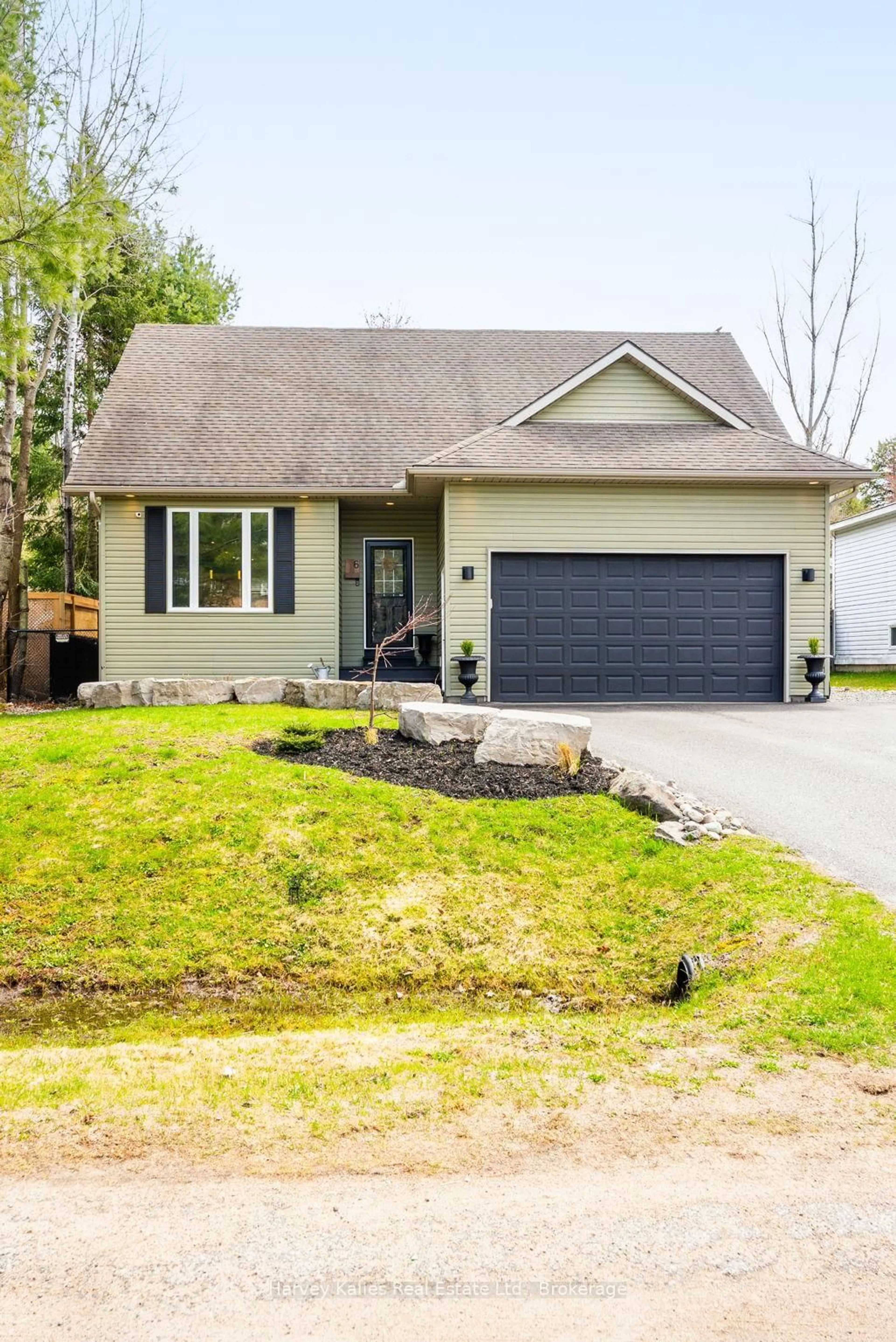 Home with vinyl exterior material, street for 6 Johnston St, Muskoka Lakes Ontario P0B 1J0