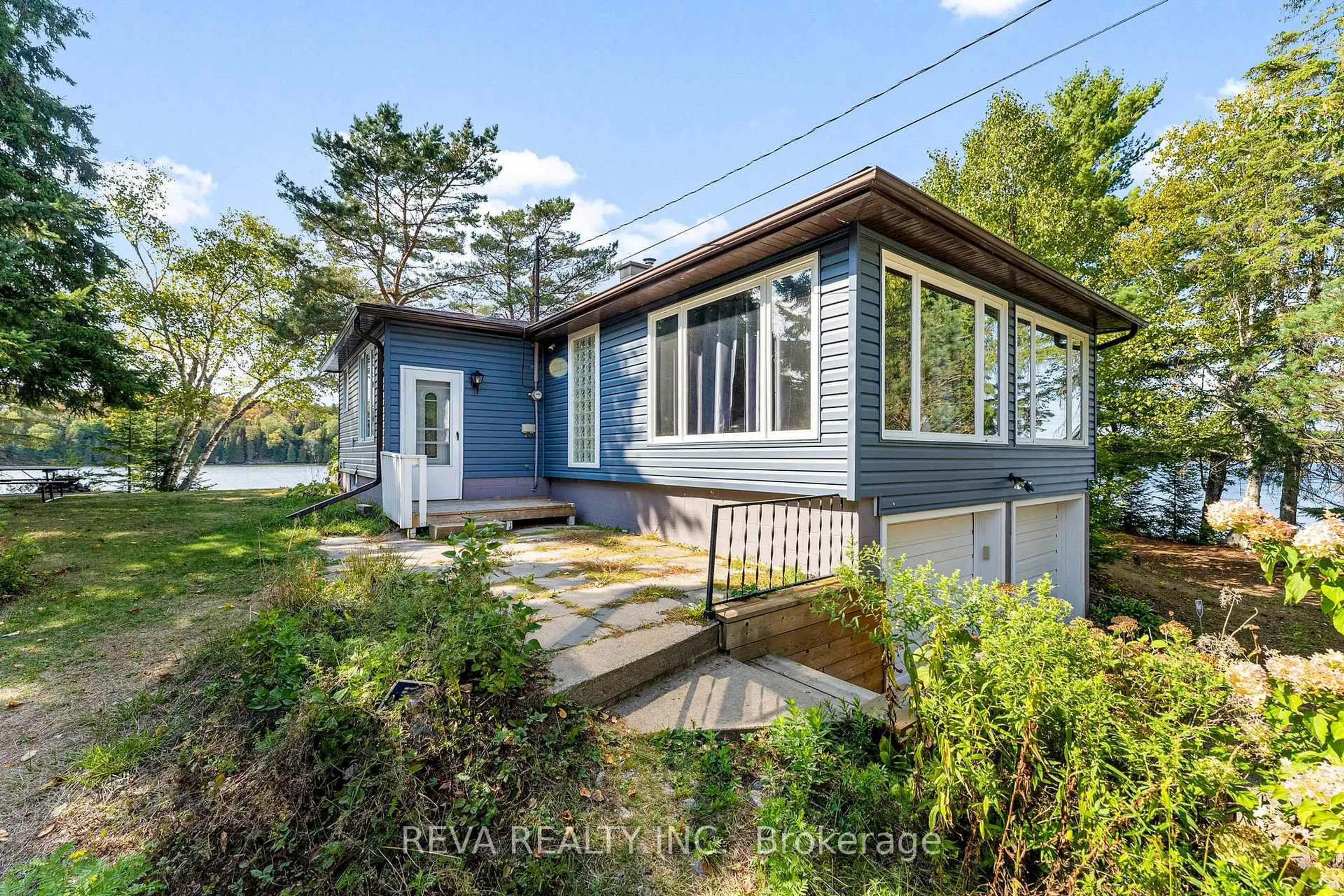 A pic from outside/outdoor area/front of a property/back of a property/a pic from drone, street for 32 Lake View Lane, Faraday Ontario K0L 1M0