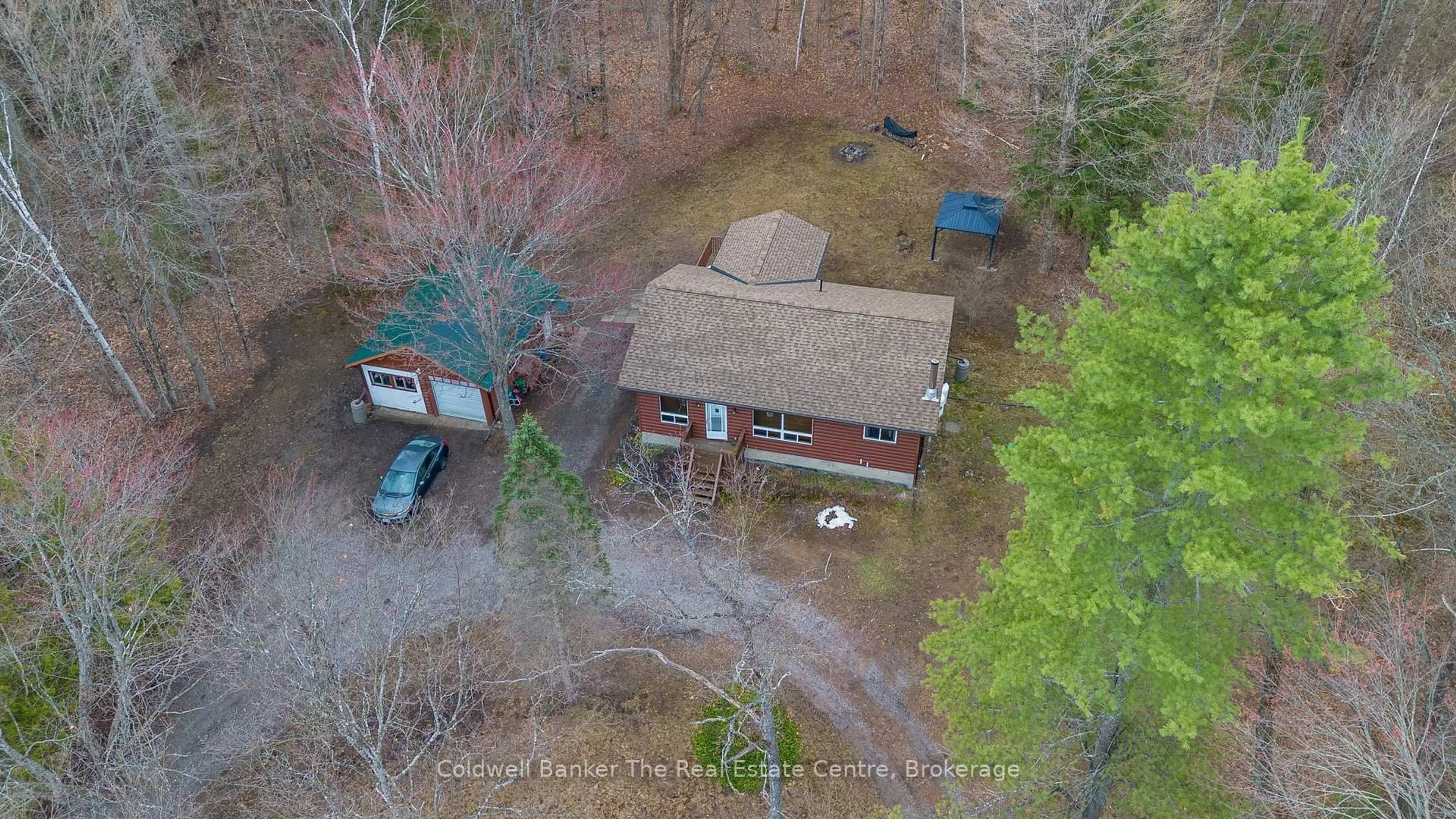 A pic from outside/outdoor area/front of a property/back of a property/a pic from drone, unknown for 3016 118 Highway, Bracebridge Ontario P1L 1X1
