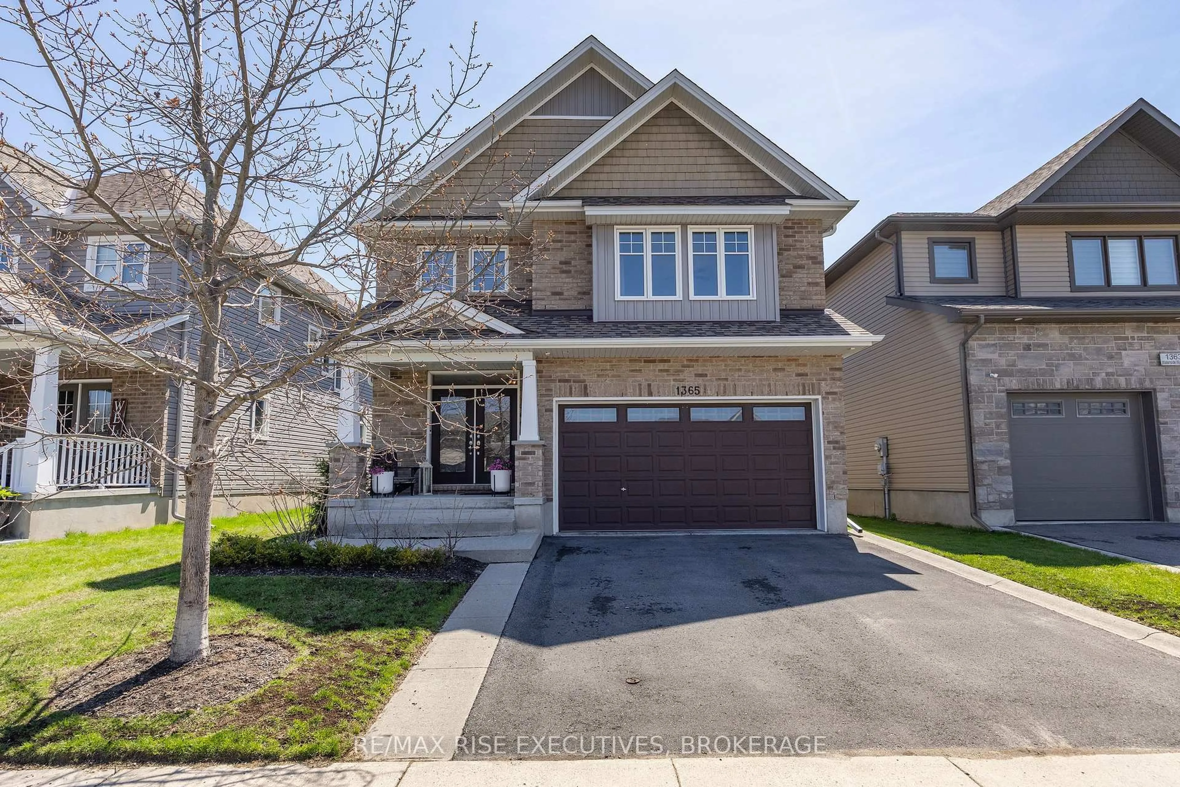 Home with brick exterior material, street for 1365 Waterside Way, Kingston Ontario K7K 0G2