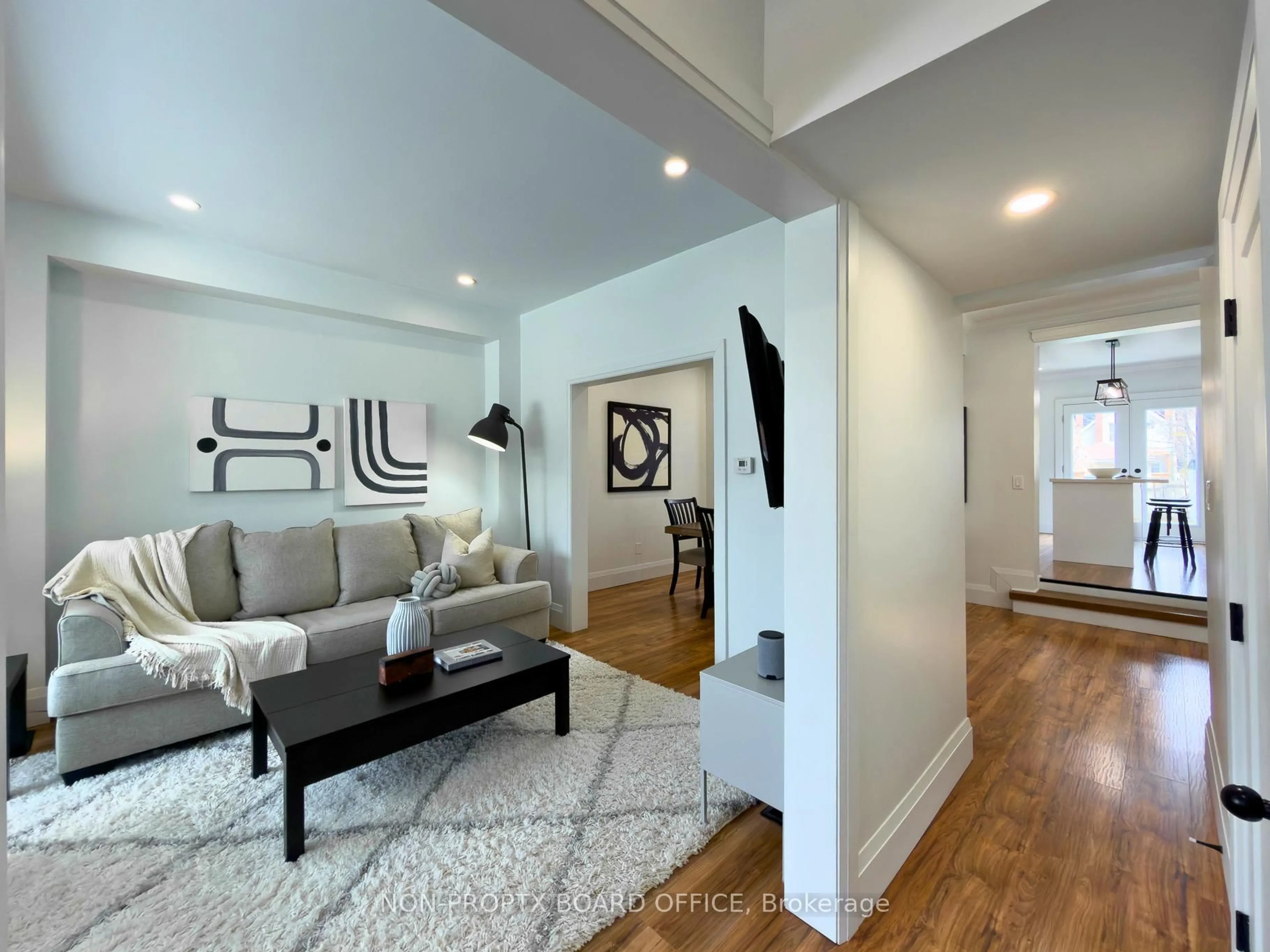 Living room with furniture, unknown for 138 Cavell Ave, Hamilton Ontario L8L 7E5