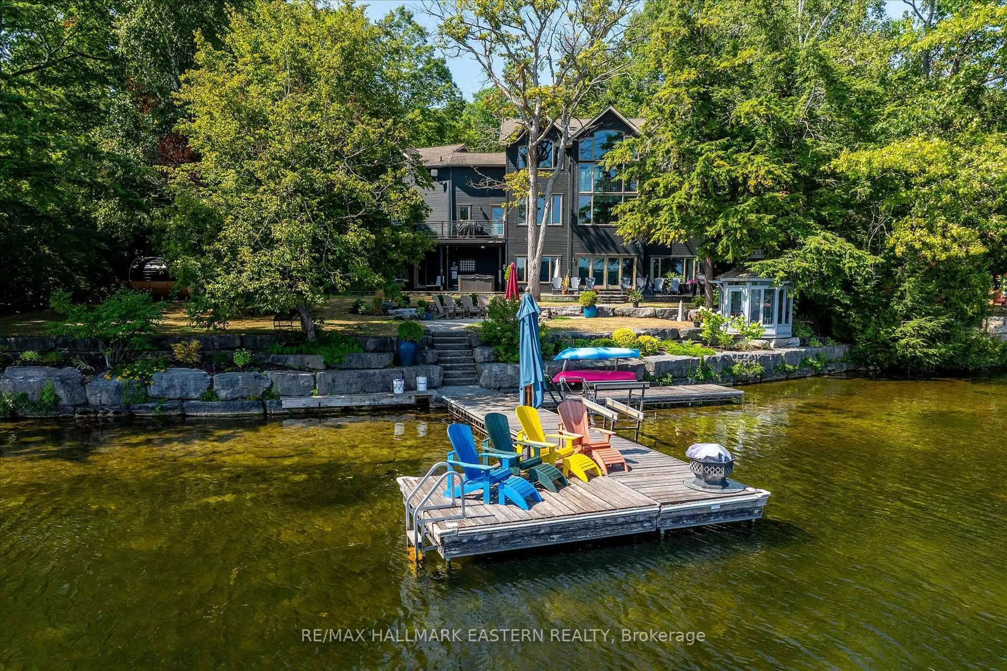 A pic from outside/outdoor area/front of a property/back of a property/a pic from drone, water/lake/river/ocean view for 1855 White Lake Rd, Douro-Dummer Ontario K0L 2H0