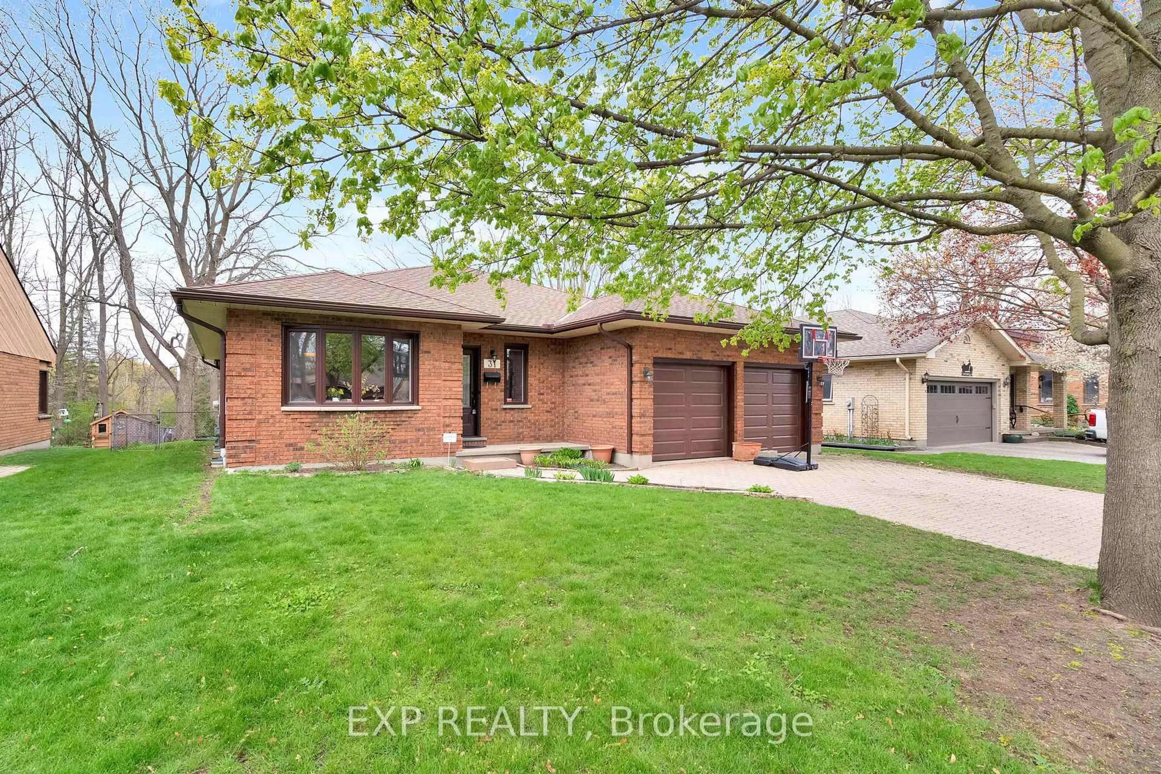 Home with brick exterior material, street for 31 Moffat Cres, London East Ontario N5W 5X2