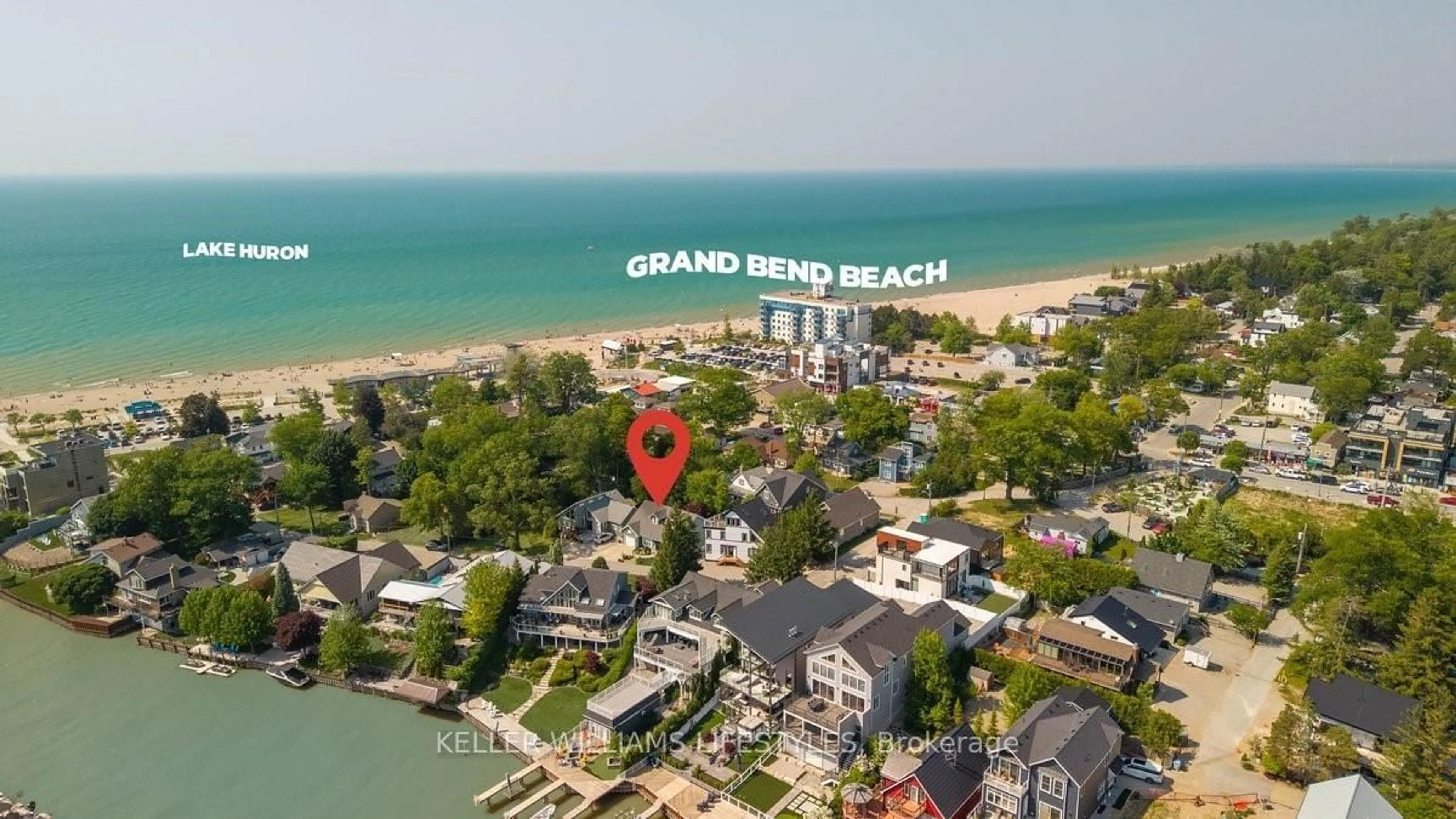 A pic from outside/outdoor area/front of a property/back of a property/a pic from drone, water/lake/river/ocean view for 40 Lakeside Circ, Lambton Shores Ontario N0M 1T0