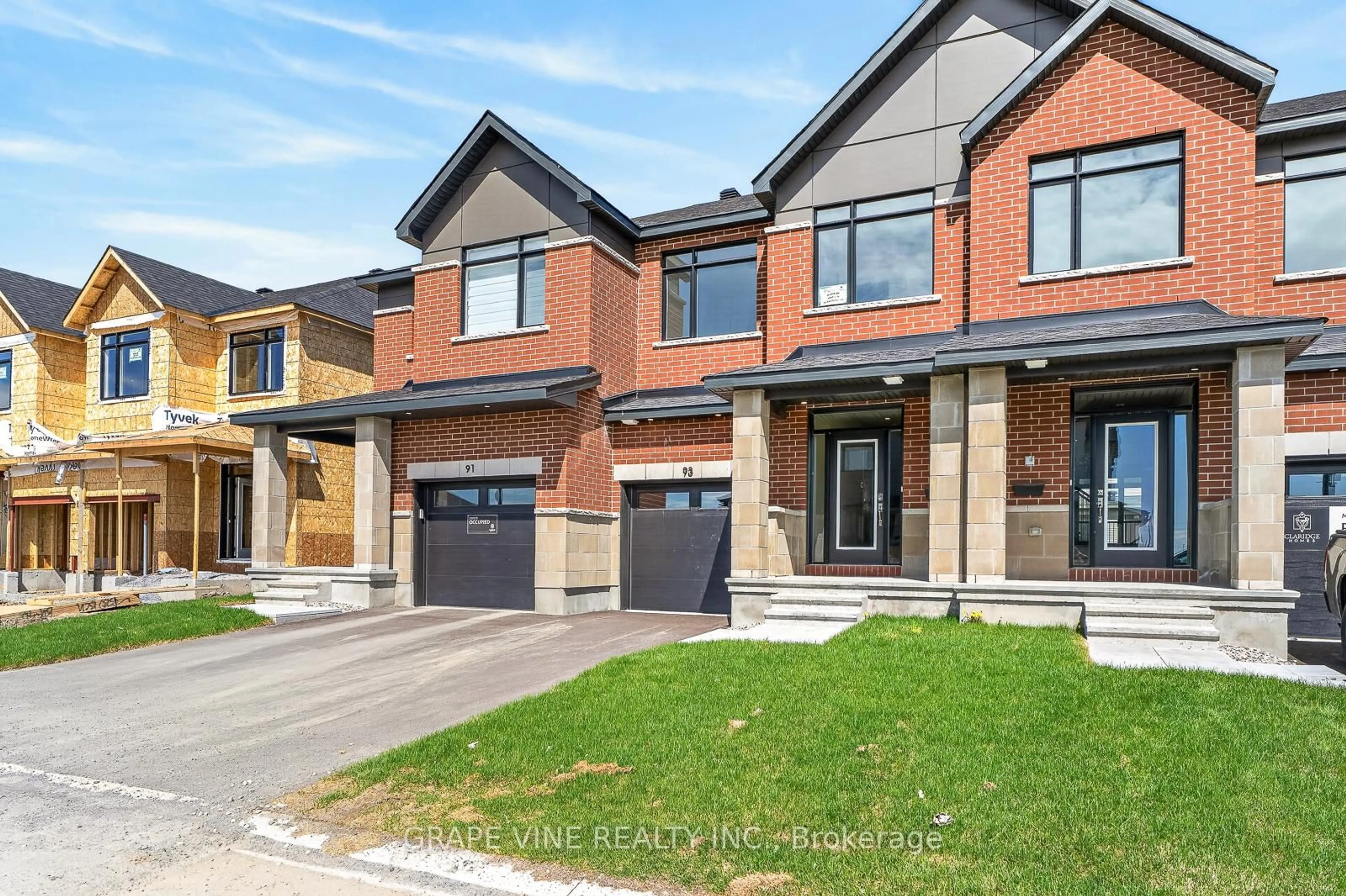 Home with brick exterior material, street for 93 San Felice Circ, Kanata Ontario K2S 2R9