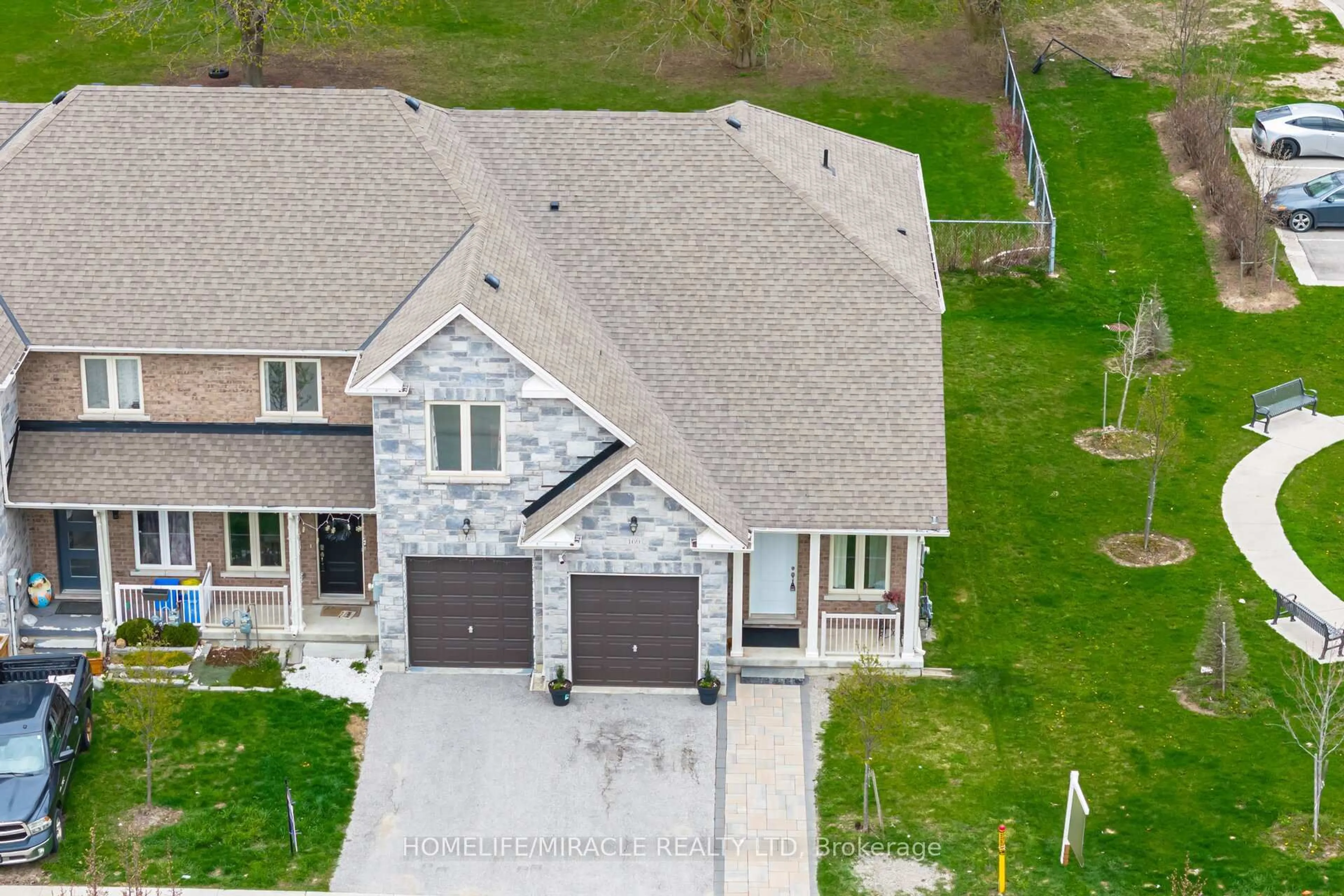 A pic from outside/outdoor area/front of a property/back of a property/a pic from drone, street for 169 Berkshire Dr, Wellington North Ontario L7A 0J7