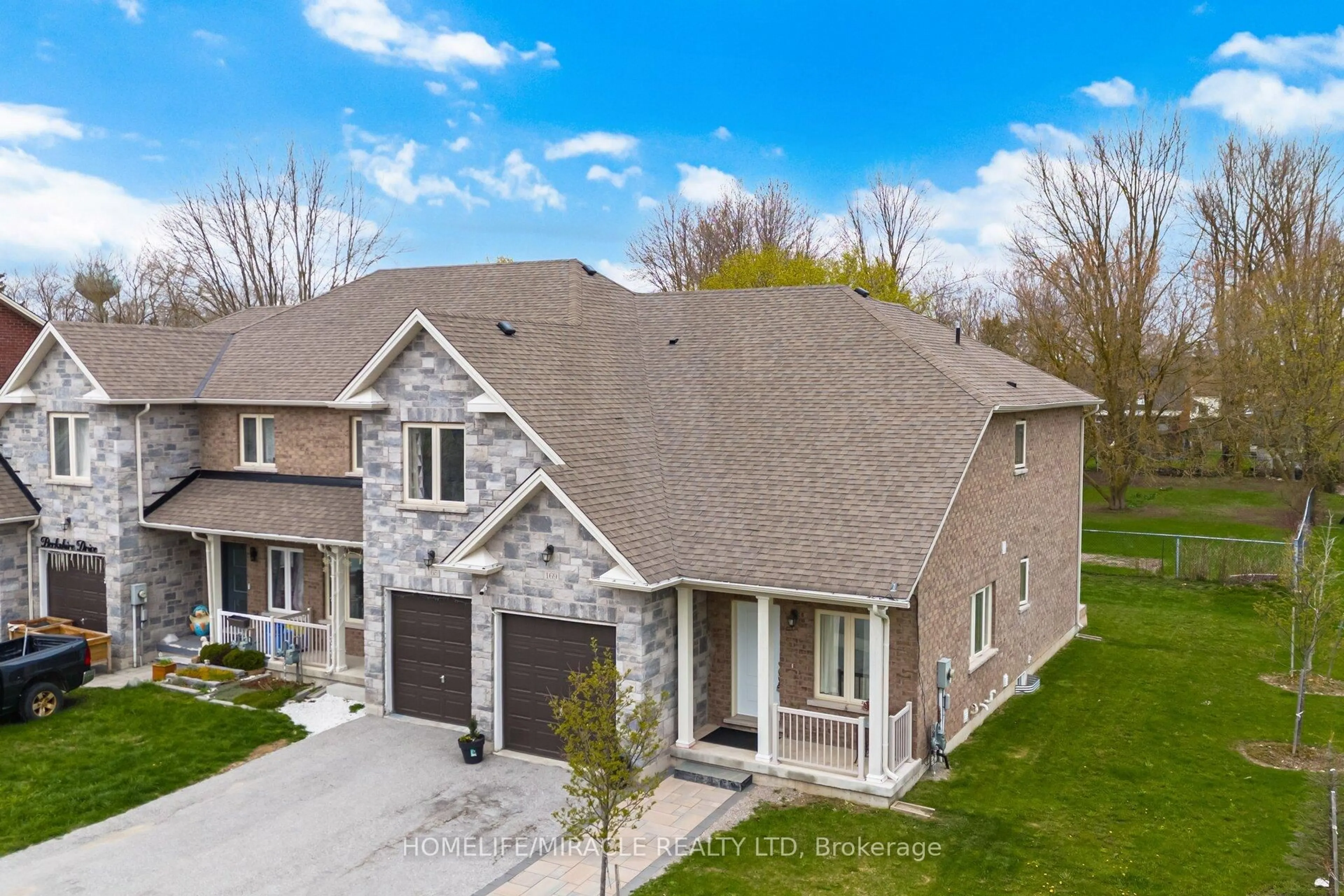 A pic from outside/outdoor area/front of a property/back of a property/a pic from drone, street for 169 Berkshire Dr, Wellington North Ontario L7A 0J7