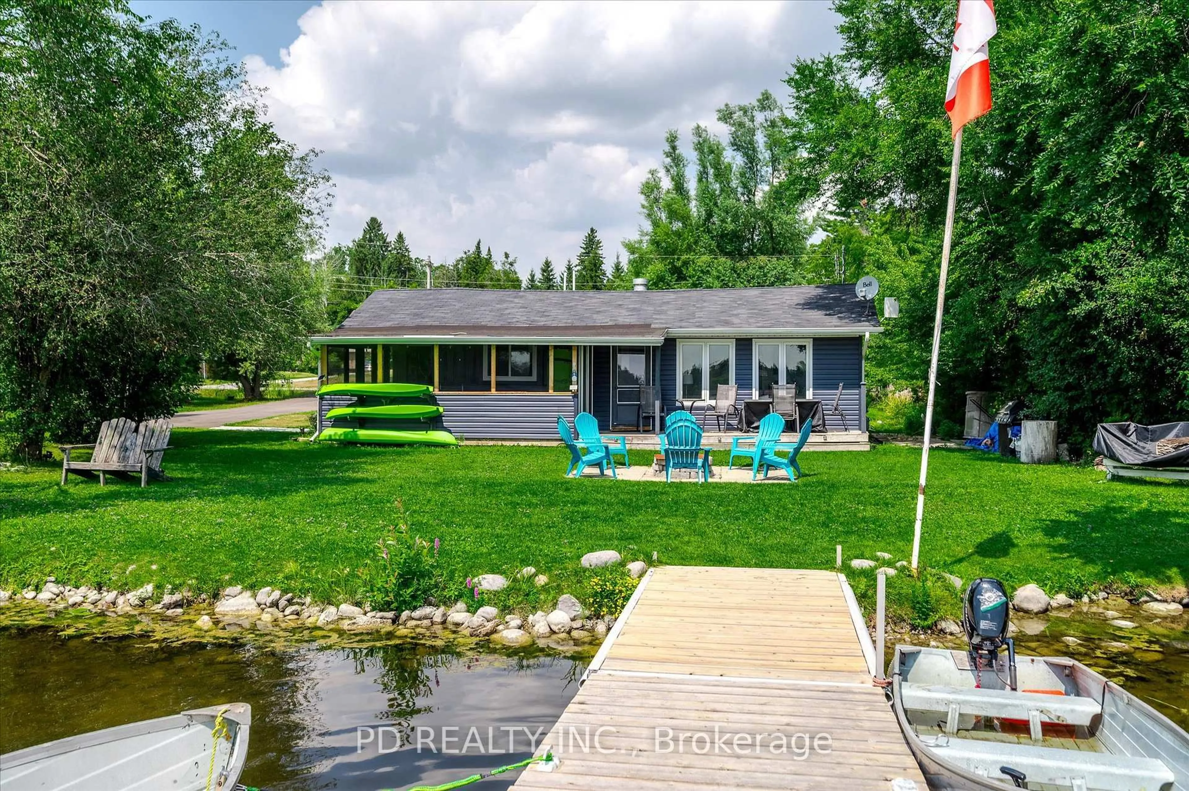 A pic from outside/outdoor area/front of a property/back of a property/a pic from drone, water/lake/river/ocean view for 9 Charlotte Cres, Kawartha Lakes Ontario K0L 2W0