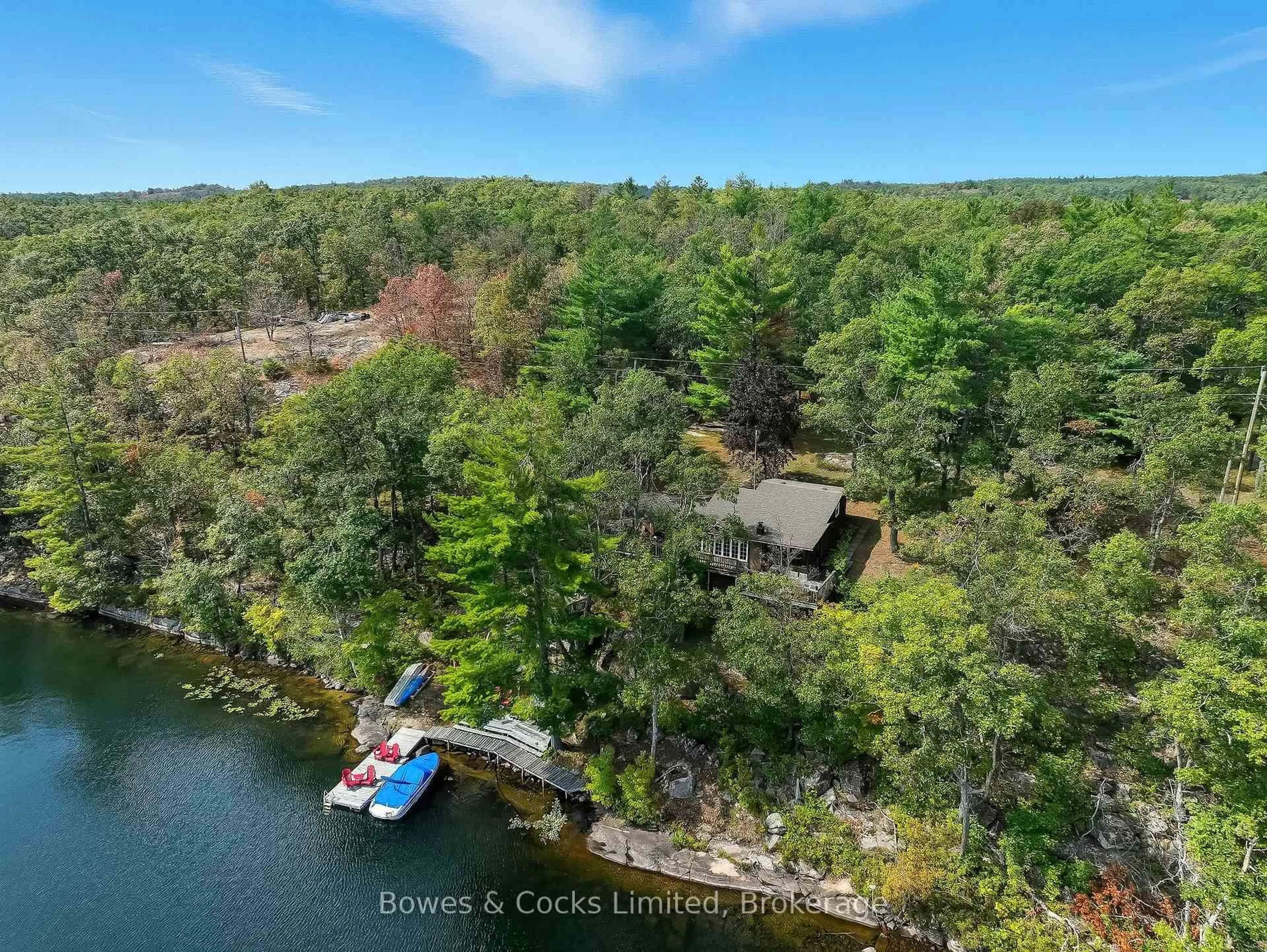 A pic from outside/outdoor area/front of a property/back of a property/a pic from drone, water/lake/river/ocean view for 207 Fire Route 82, Havelock-Belmont-Methuen Ontario K0L 1Z0