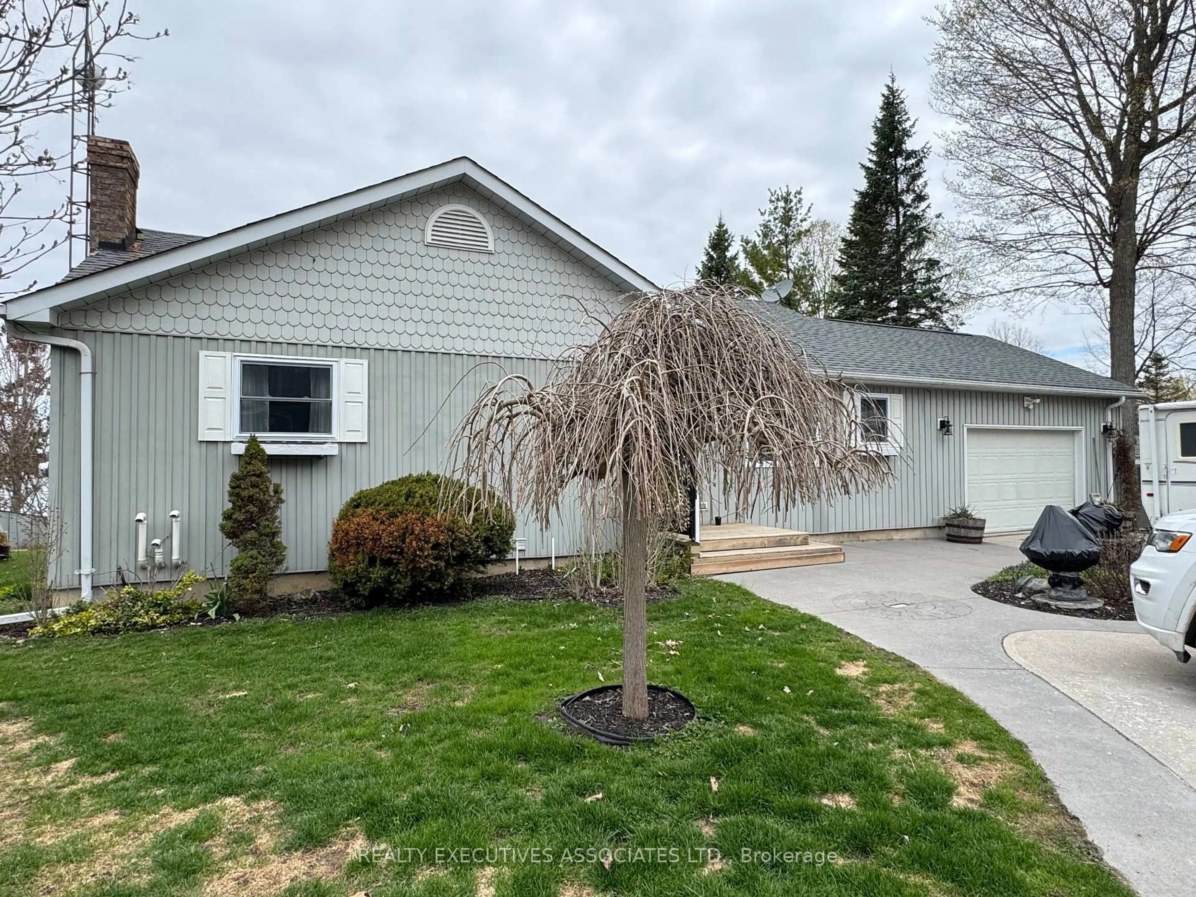 Home with vinyl exterior material, street for 36 West Lane, Trent Hills Ontario K0L 1L0