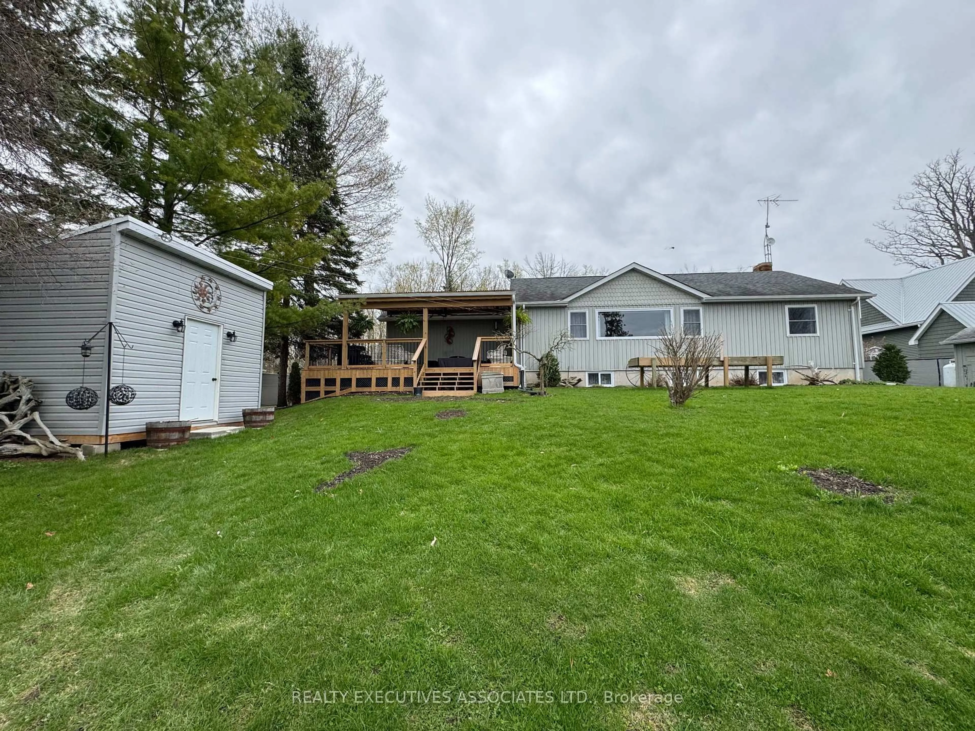 A pic from outside/outdoor area/front of a property/back of a property/a pic from drone, water/lake/river/ocean view for 36 West Lane, Trent Hills Ontario K0L 1L0