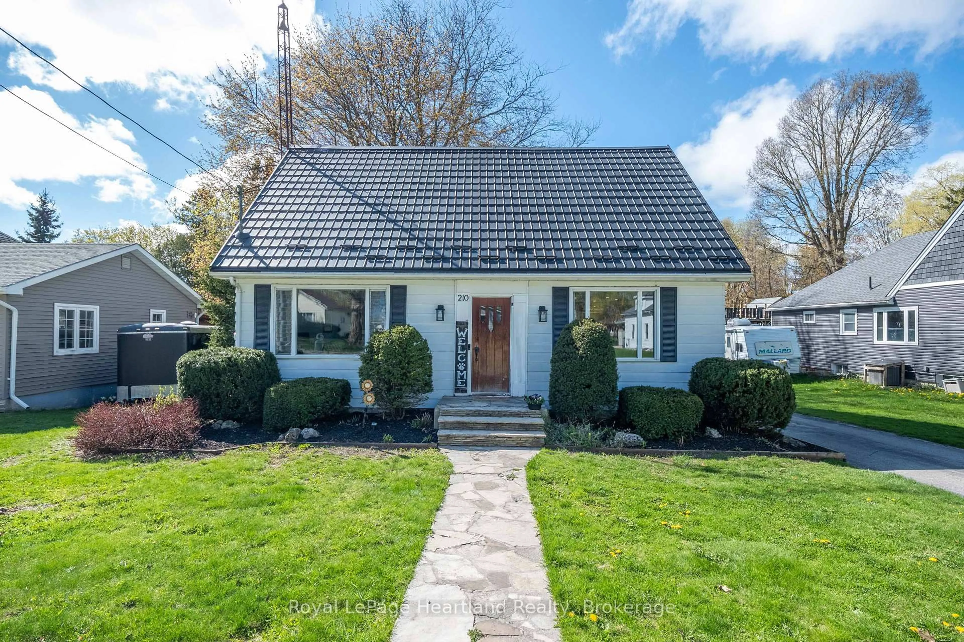 Home with vinyl exterior material, street for 210 LEOPOLD St, North Huron Ontario N0G 2W0
