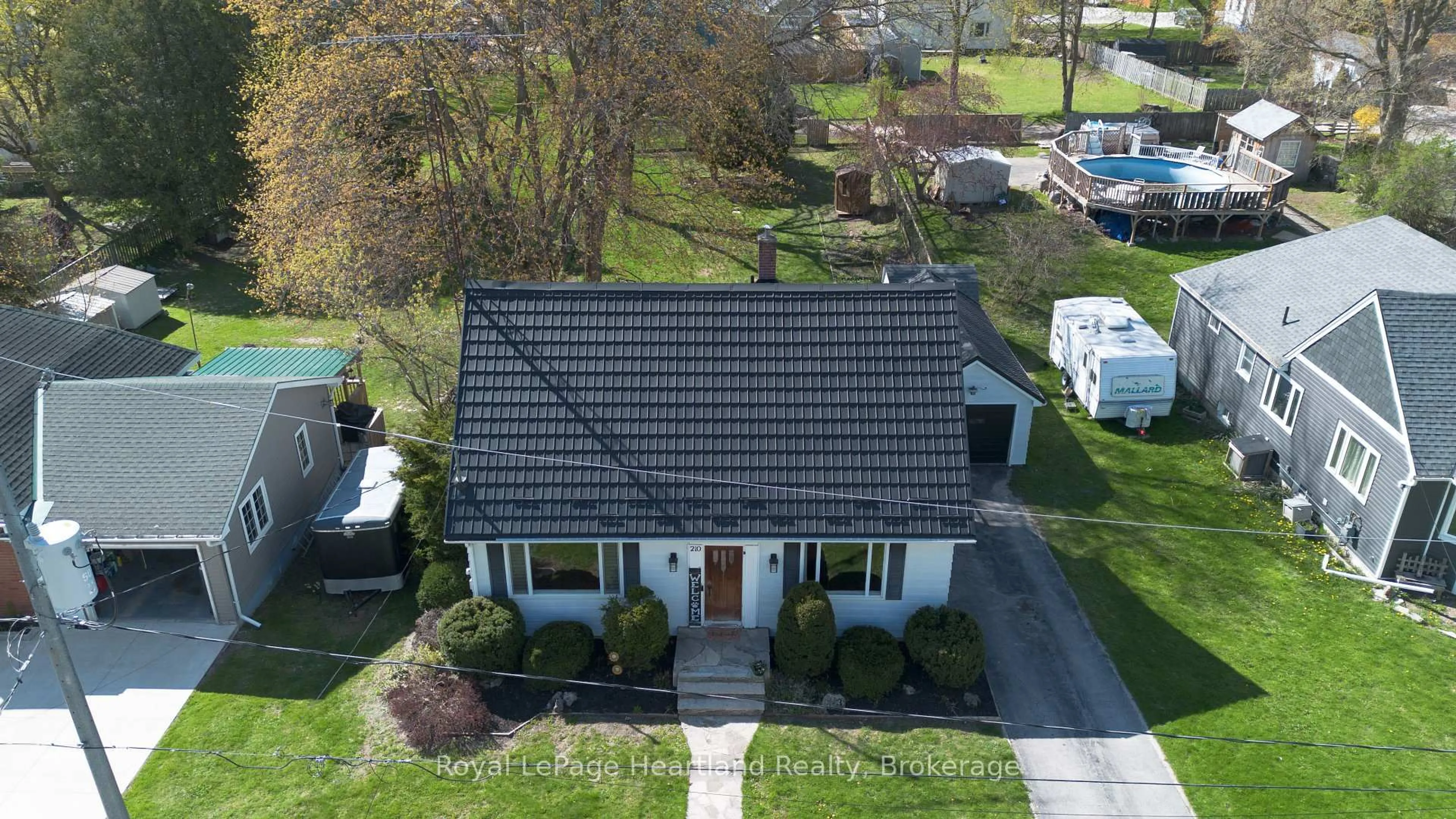 A pic from outside/outdoor area/front of a property/back of a property/a pic from drone, street for 210 LEOPOLD St, North Huron Ontario N0G 2W0