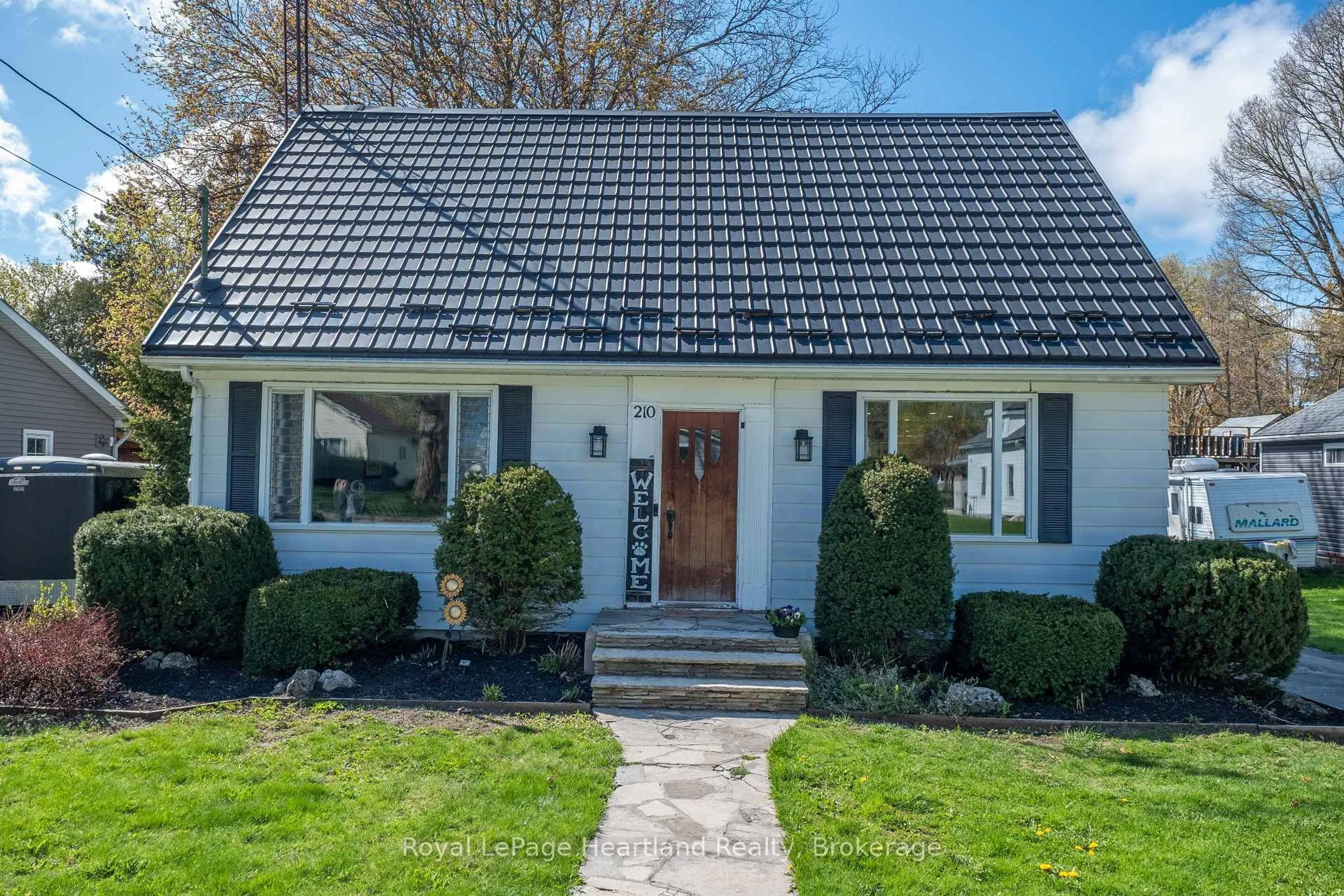 Home with brick exterior material, street for 210 LEOPOLD St, North Huron Ontario N0G 2W0