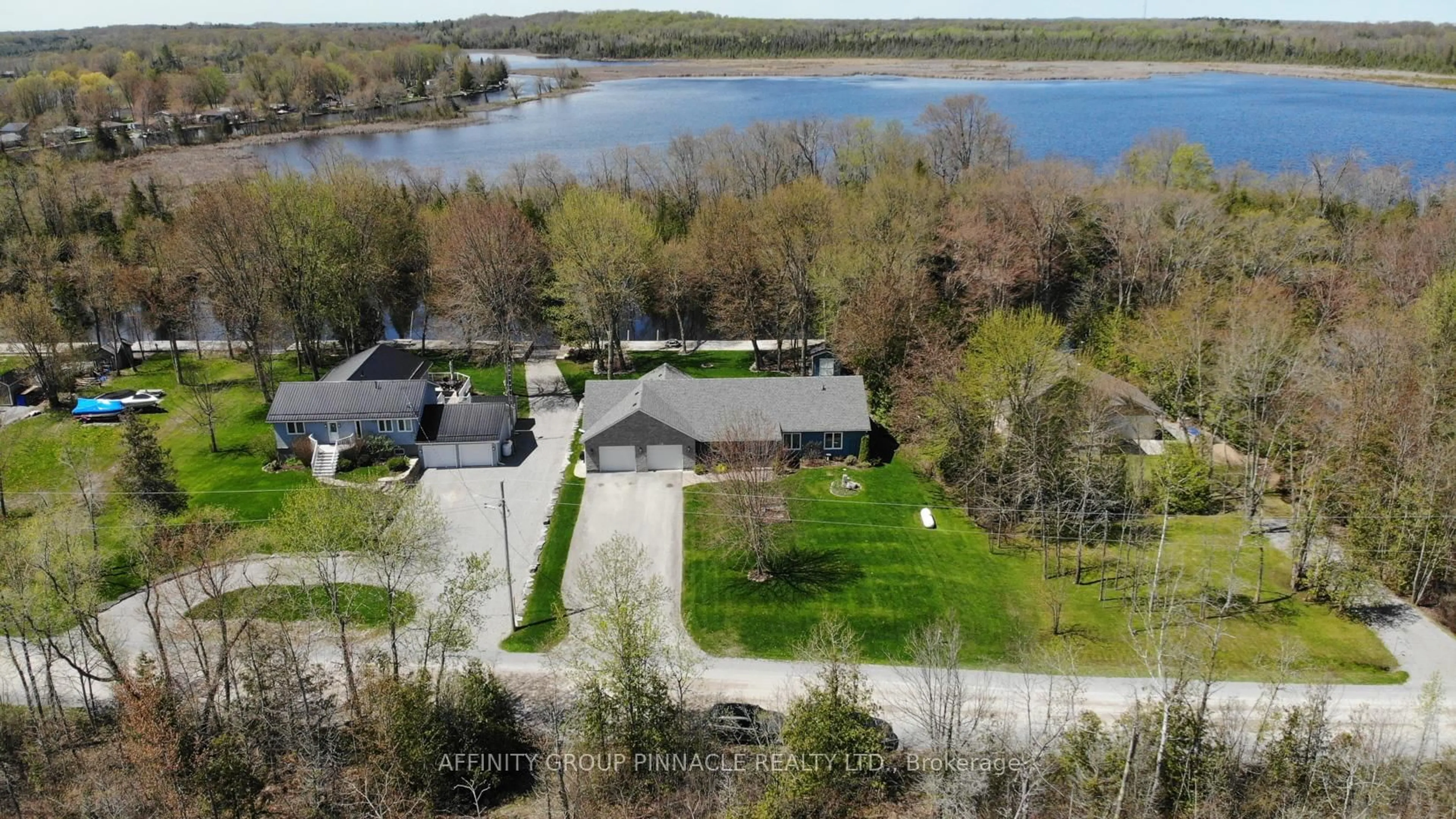 A pic from outside/outdoor area/front of a property/back of a property/a pic from drone, water/lake/river/ocean view for 210 Moorings Dr, Kawartha Lakes Ontario K0M 1N0