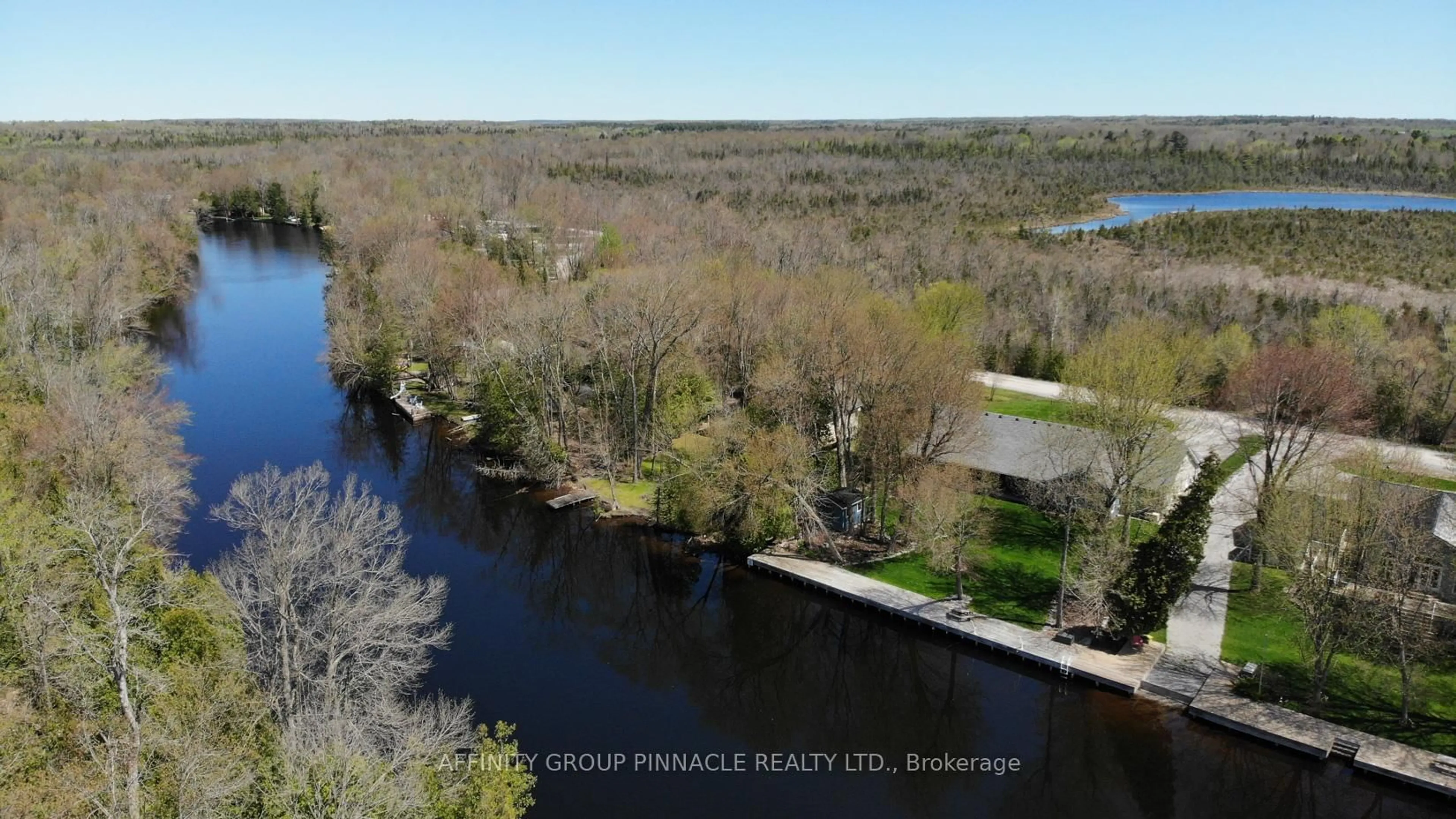 A pic from outside/outdoor area/front of a property/back of a property/a pic from drone, water/lake/river/ocean view for 210 Moorings Dr, Kawartha Lakes Ontario K0M 1N0