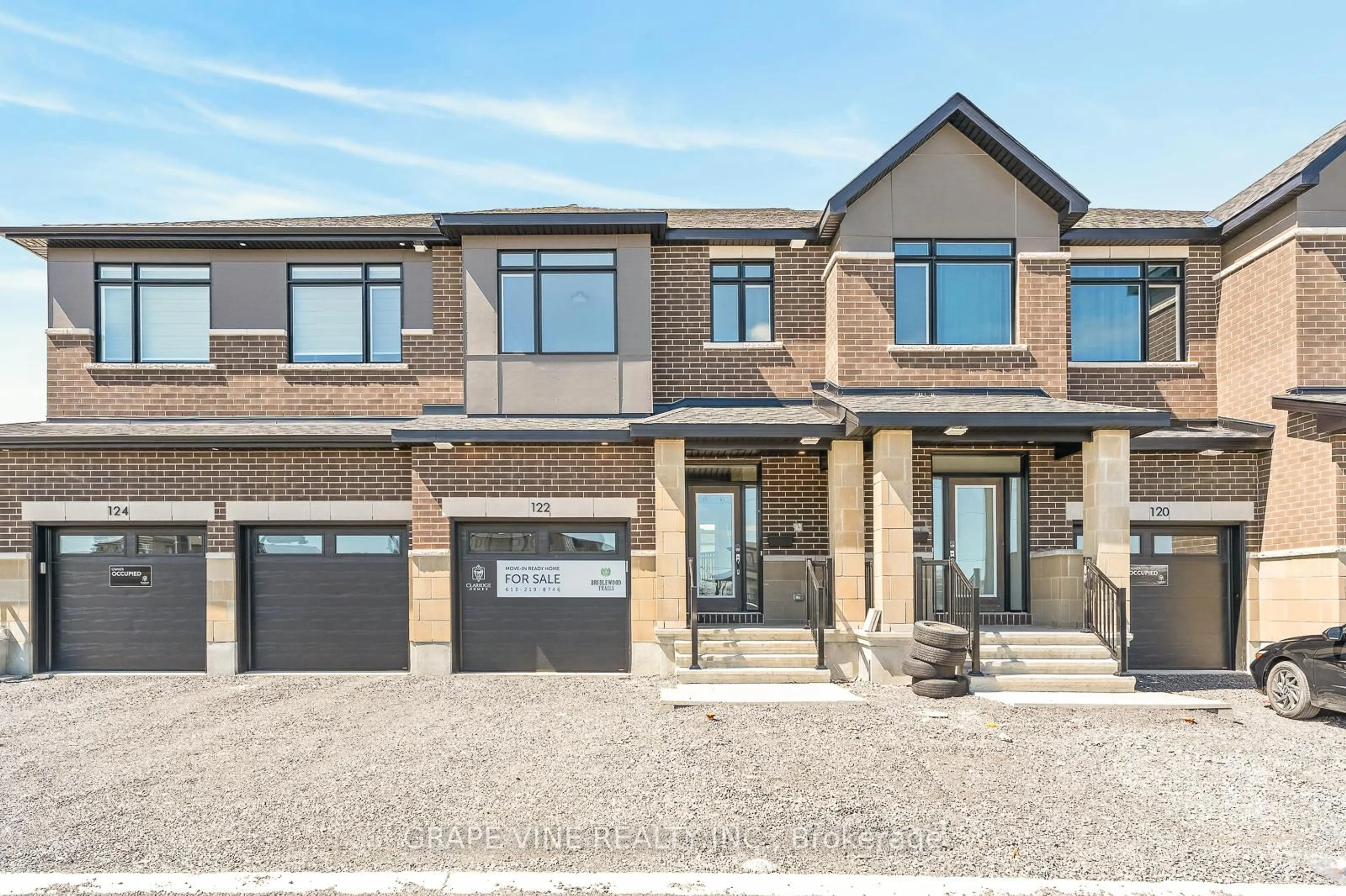 Home with brick exterior material, street for 122 San Felice Circ, Ottawa Ontario K2S 2S7