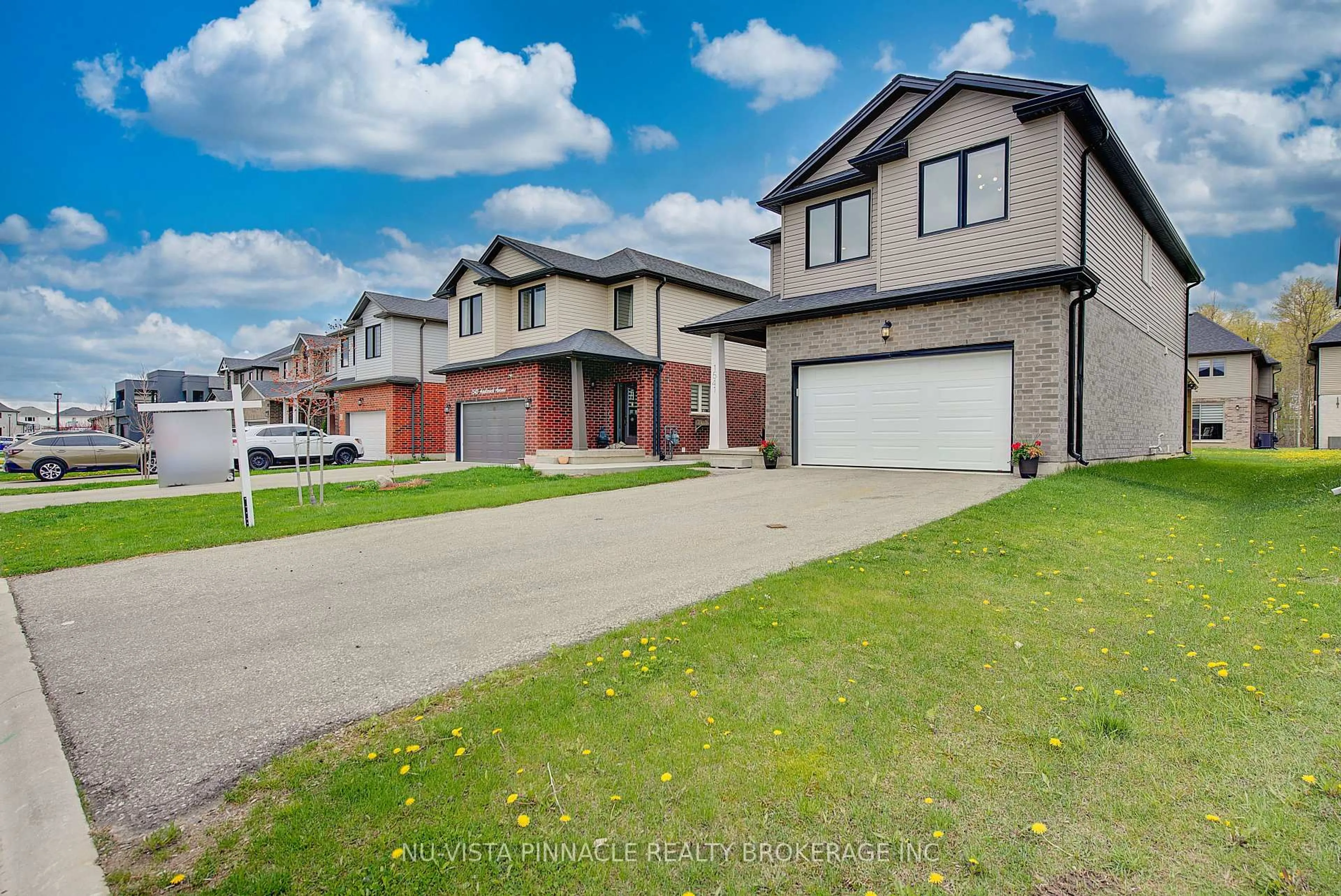 A pic from outside/outdoor area/front of a property/back of a property/a pic from drone, street for 1541 Applerock Ave, London North Ontario N6G 0M7