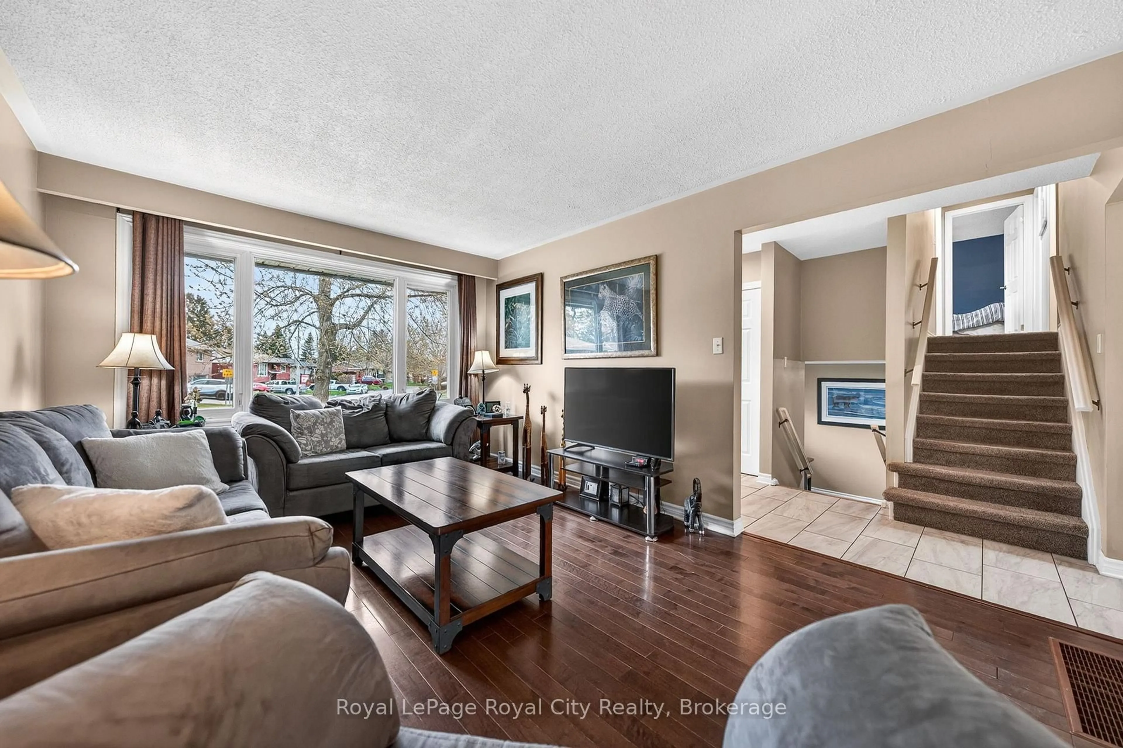 Living room with furniture, unknown for 16 Sanderson Dr, Guelph Ontario N1H 6T8