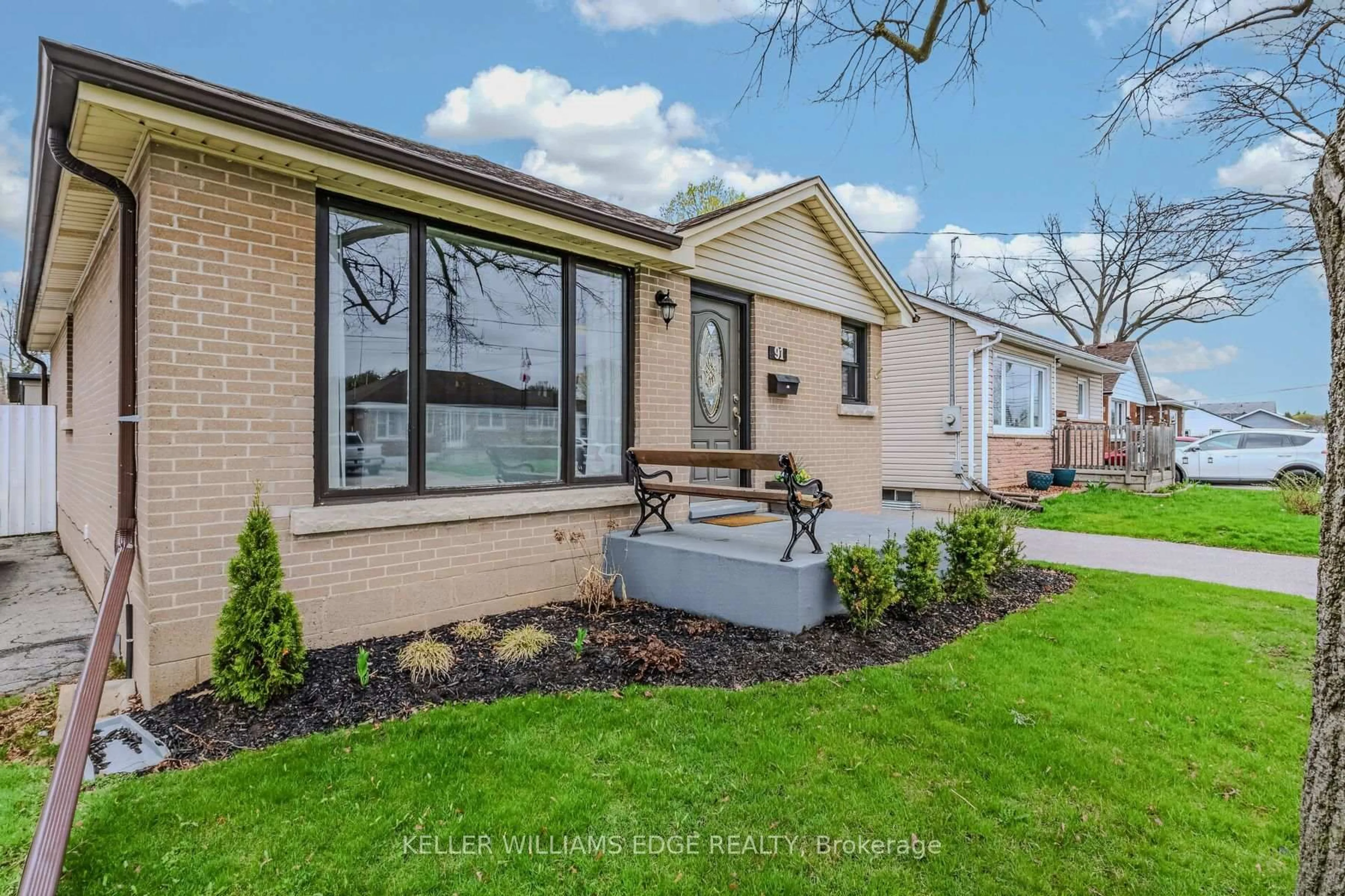 Home with brick exterior material, street for 91 Ninth Ave, Brantford Ontario N3S 1E6