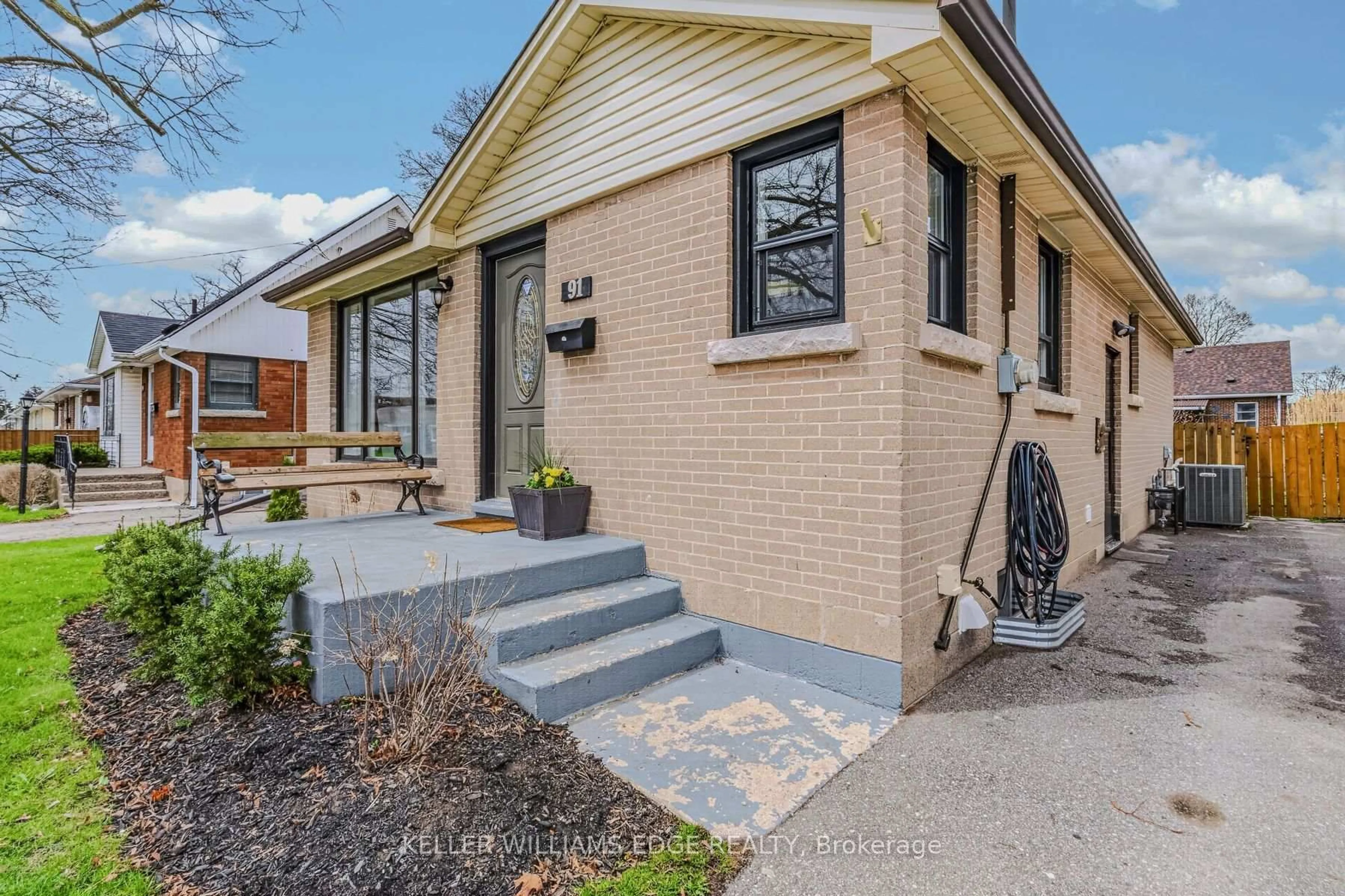 Home with brick exterior material, street for 91 Ninth Ave, Brantford Ontario N3S 1E6
