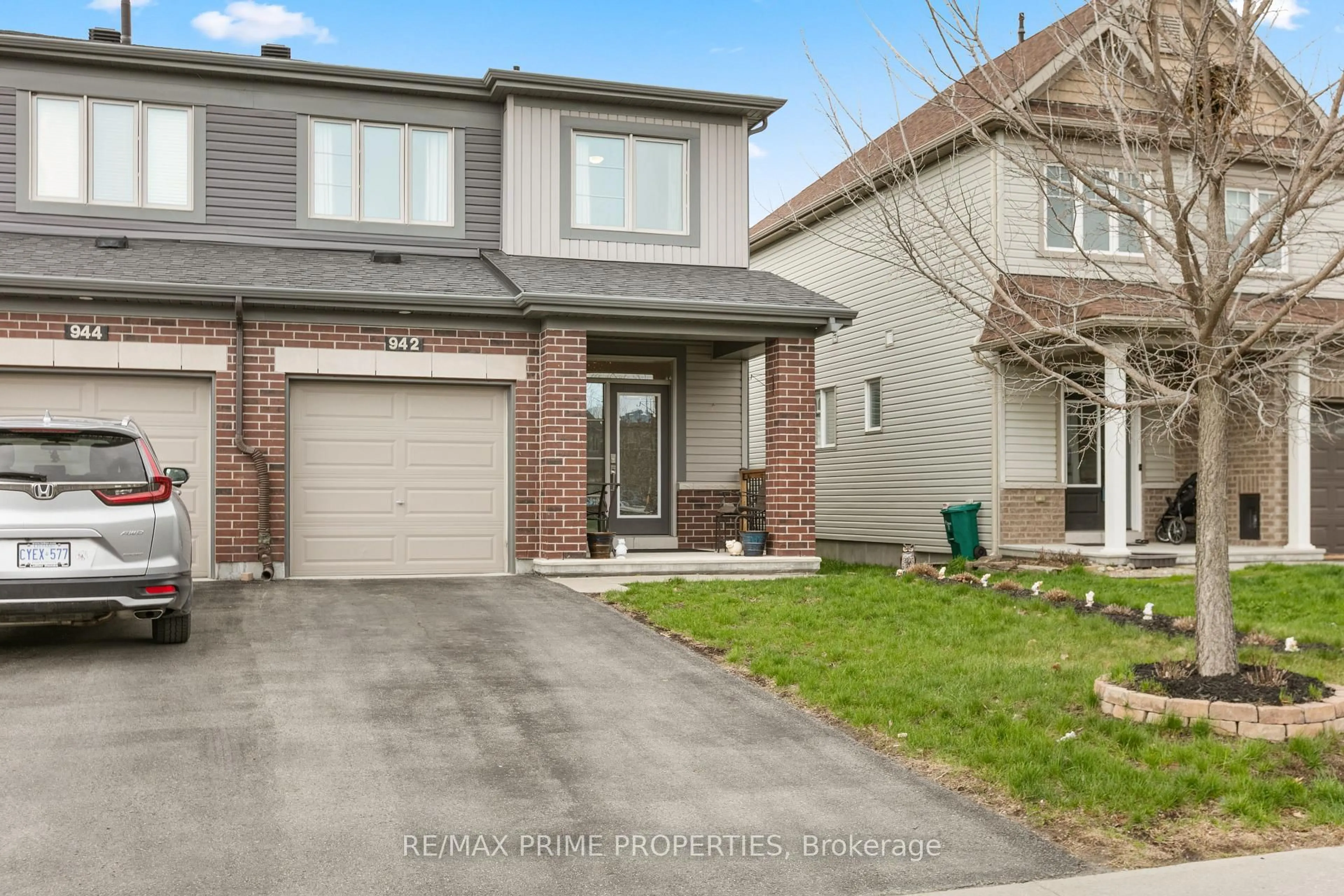 Home with brick exterior material, street for 942 Kilbirnie Dr, Ottawa Ontario K2J 5T9