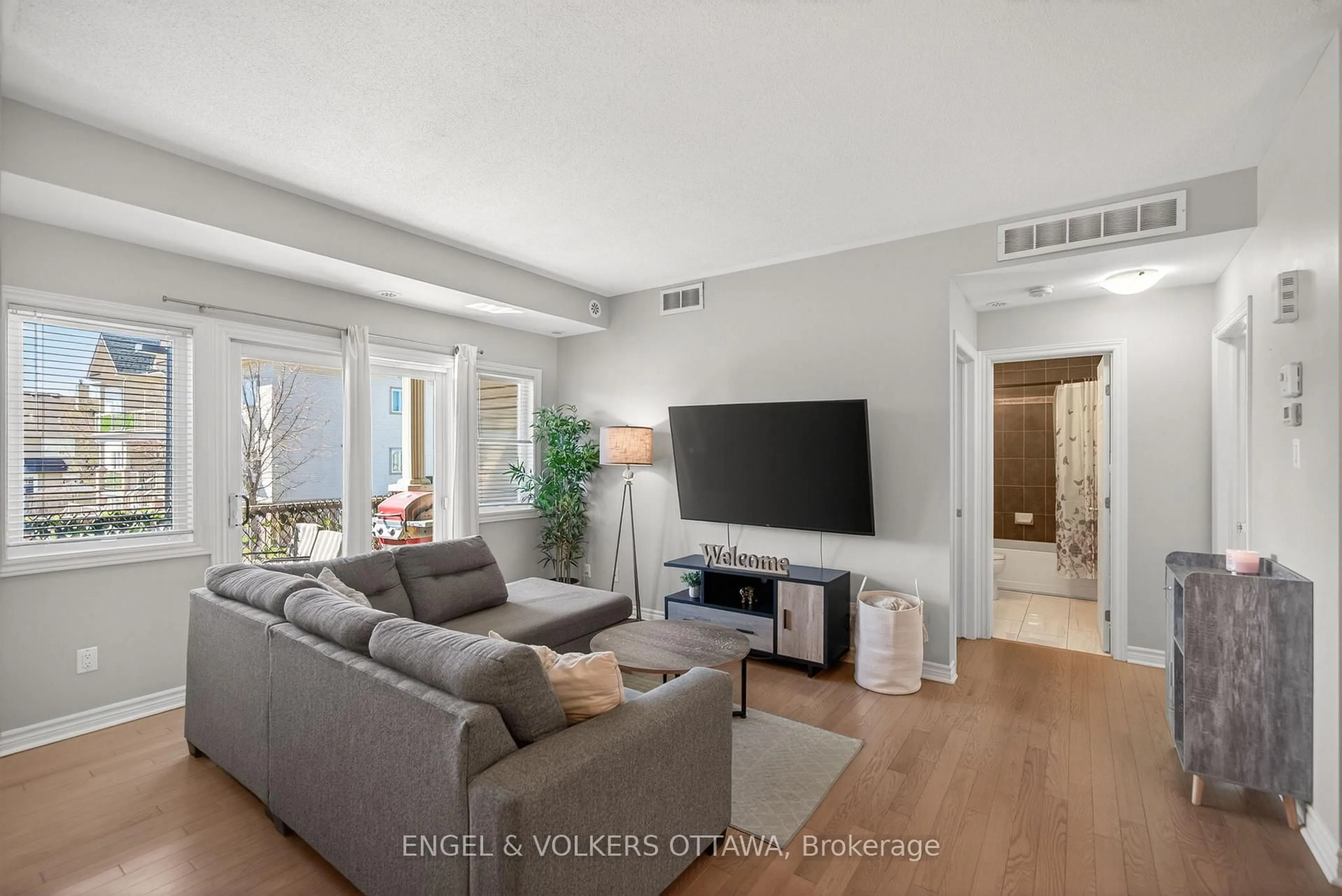 Living room with furniture, unknown for 221 Espresso Private #C, Ottawa Ontario K1T 0K5