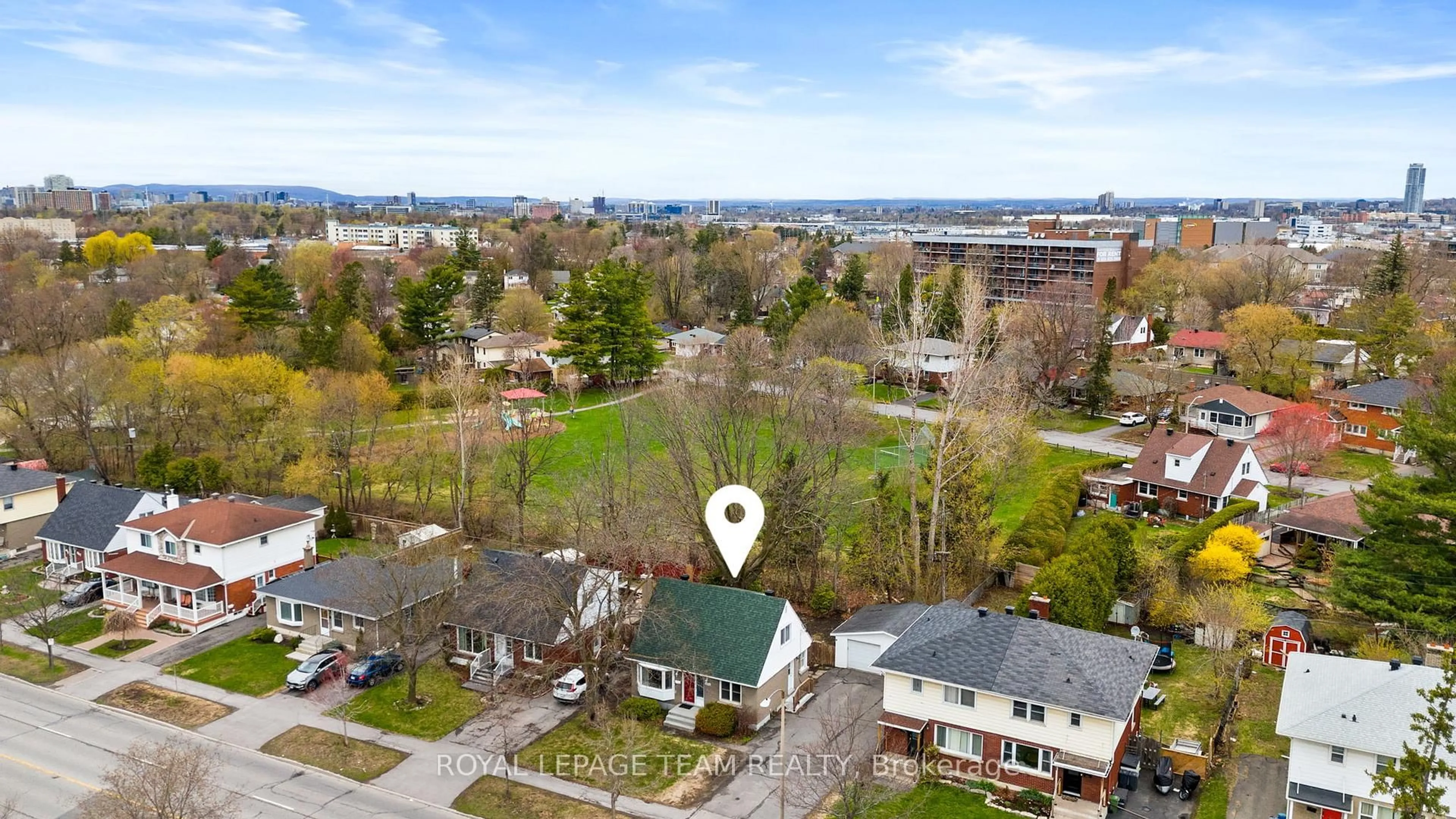 A pic from outside/outdoor area/front of a property/back of a property/a pic from drone, unknown for 873 Smyth Rd, Ottawa Ontario K1G 1P4