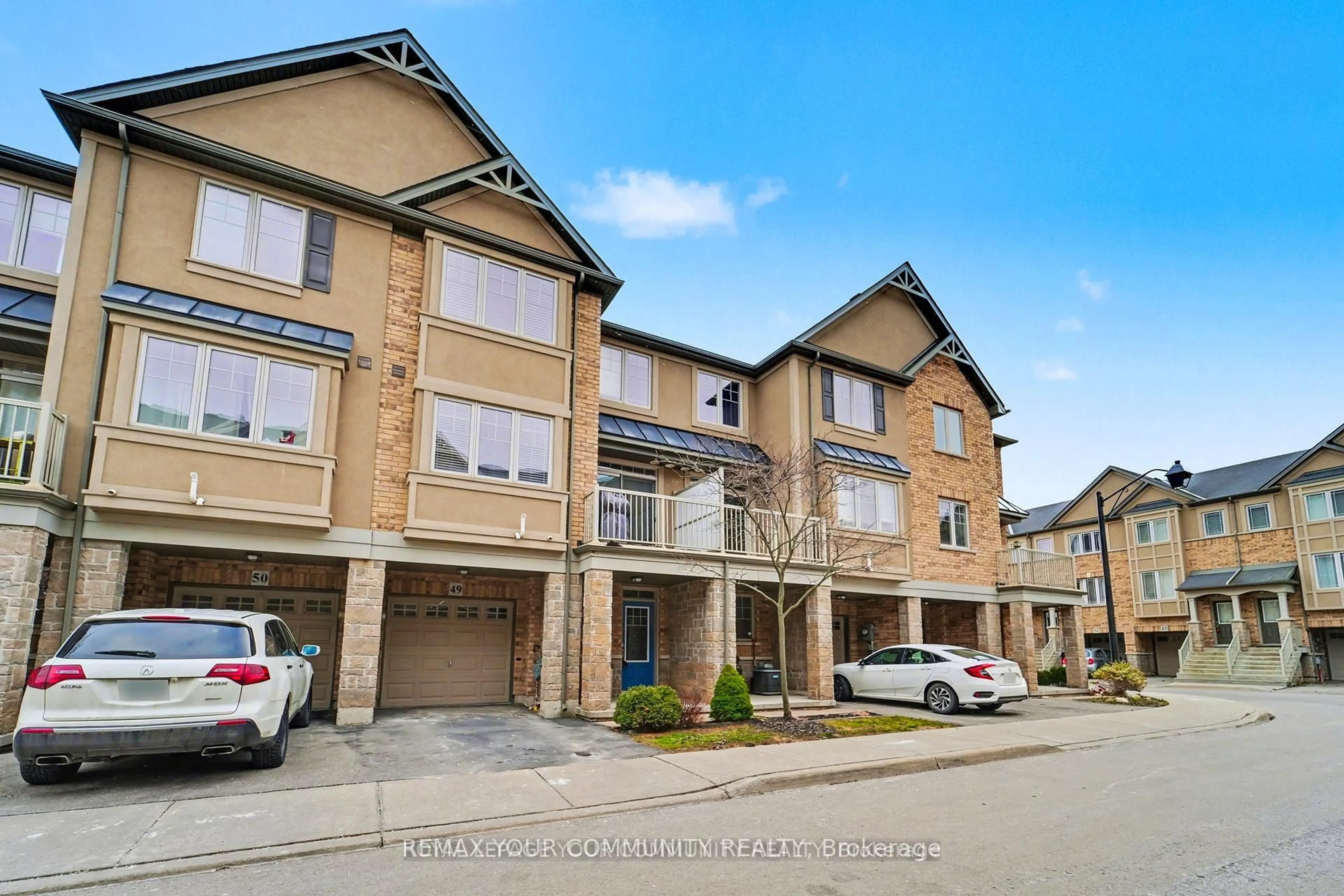 A pic from outside/outdoor area/front of a property/back of a property/a pic from drone, street for 201 Westbank Tr #49, Hamilton Ontario L8J 0H4