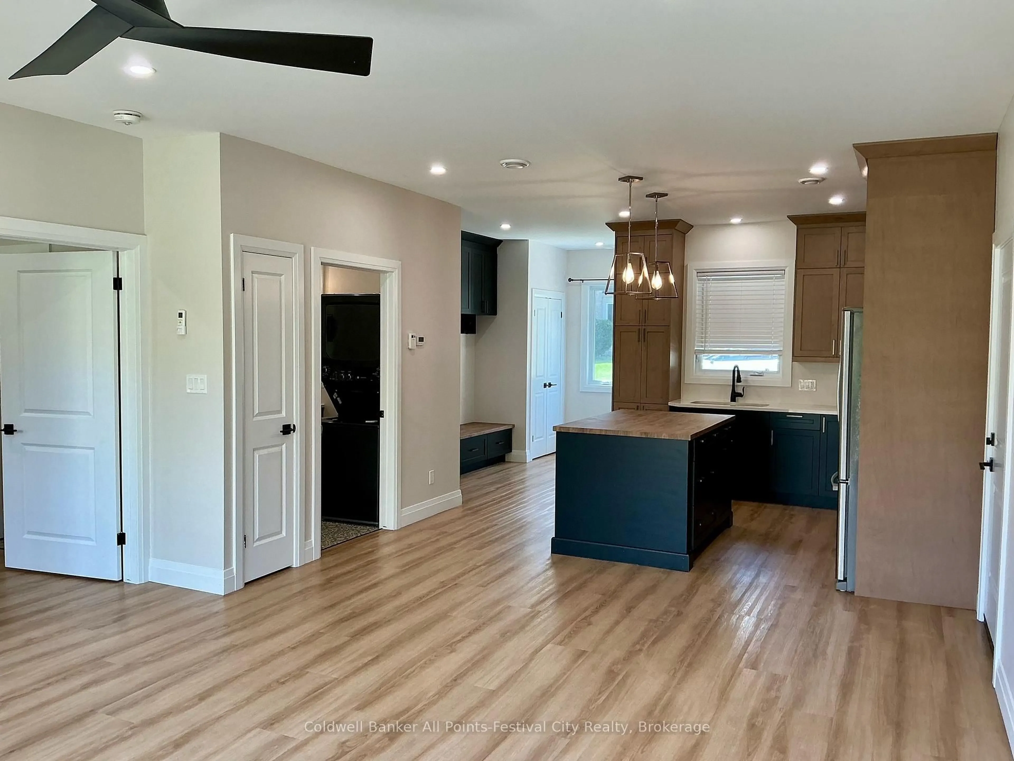 Open concept kitchen, wood/laminate floor for 81 Sports Dr, Huron East Ontario N0G 1H0