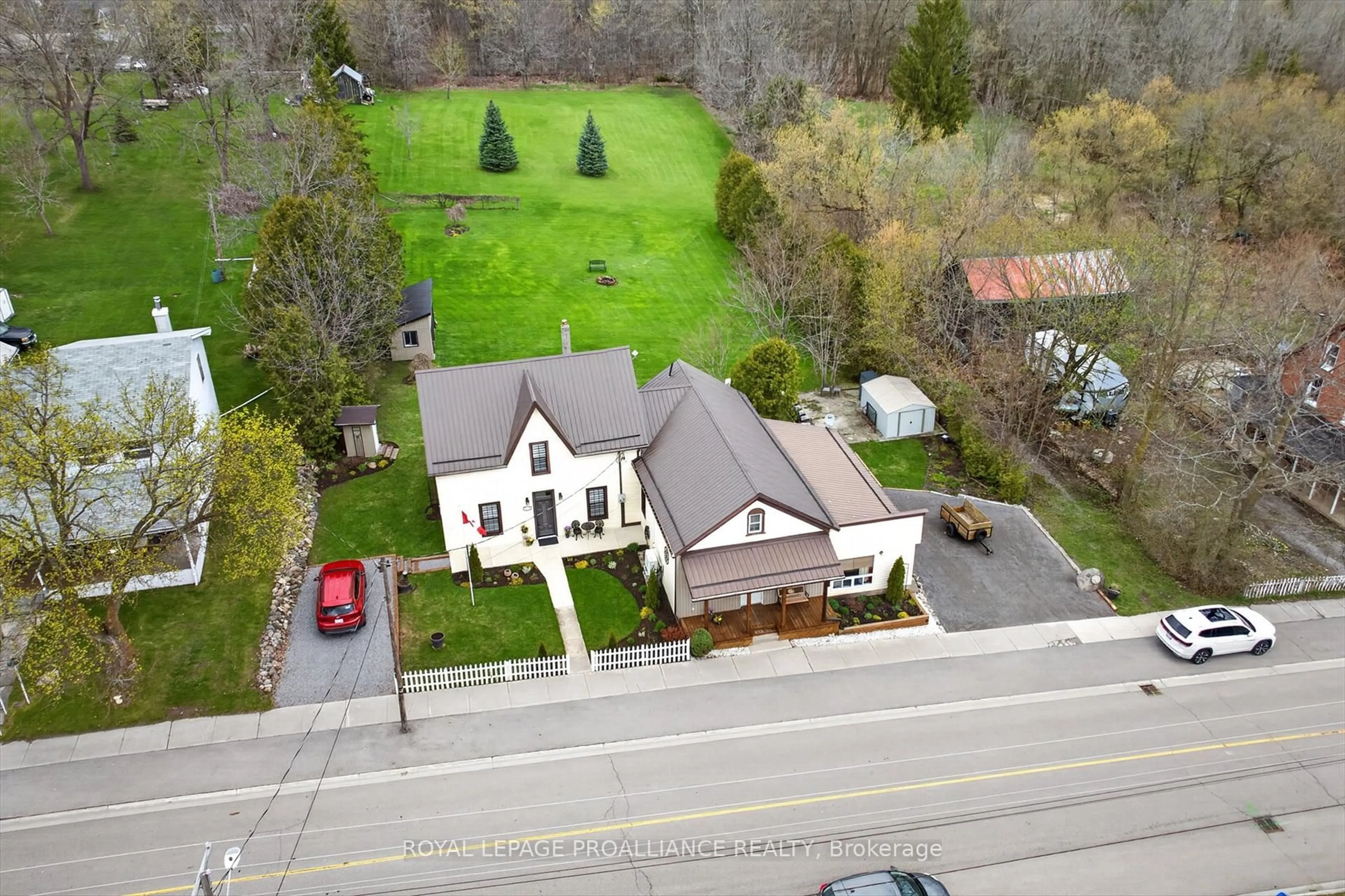 A pic from outside/outdoor area/front of a property/back of a property/a pic from drone, street for 11932 County Rd 24, Alnwick/Haldimand Ontario K0K 2X0