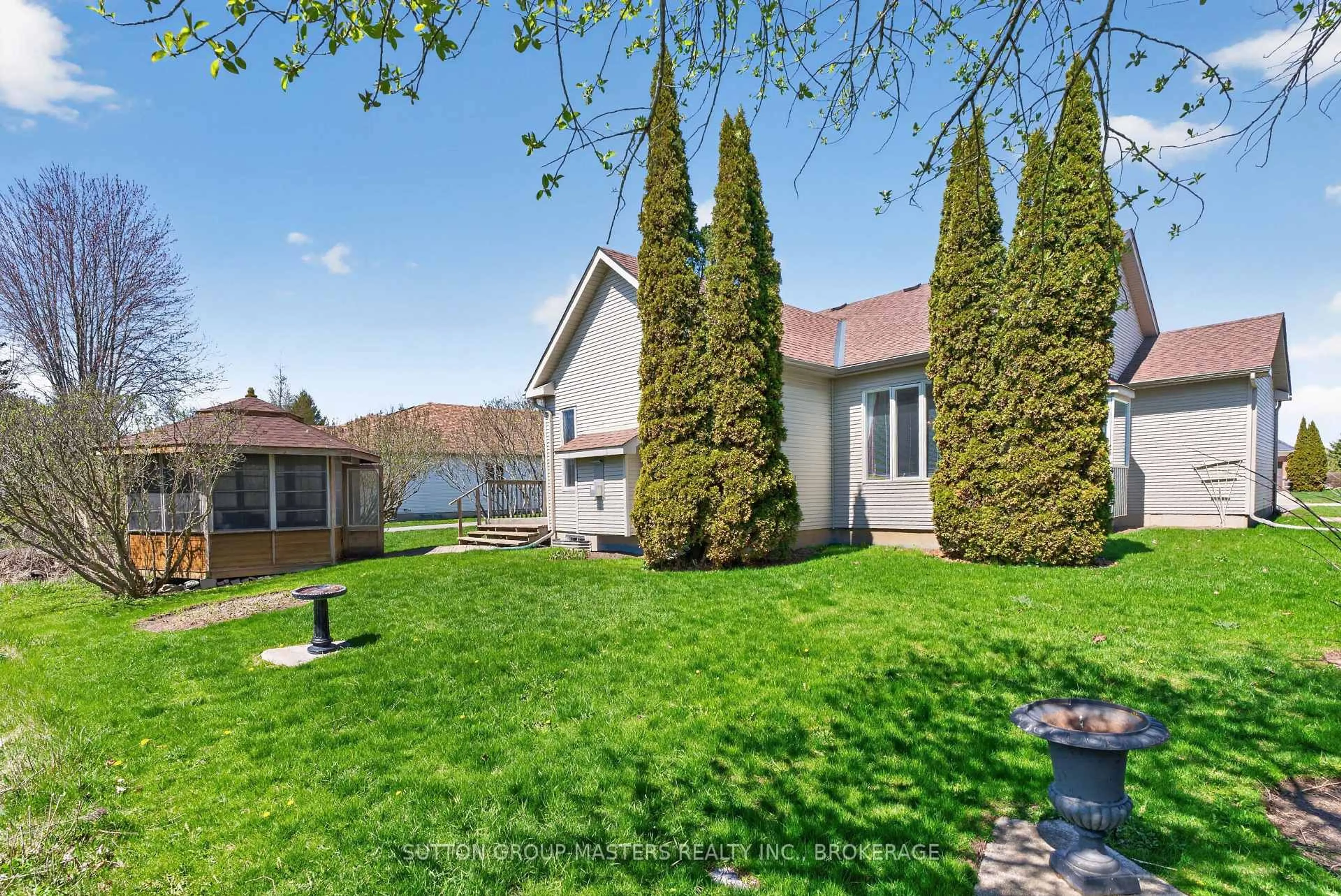 A pic from outside/outdoor area/front of a property/back of a property/a pic from drone, unknown for 104 Abbey Dawn Dr, Bath Ontario K0H 1G0