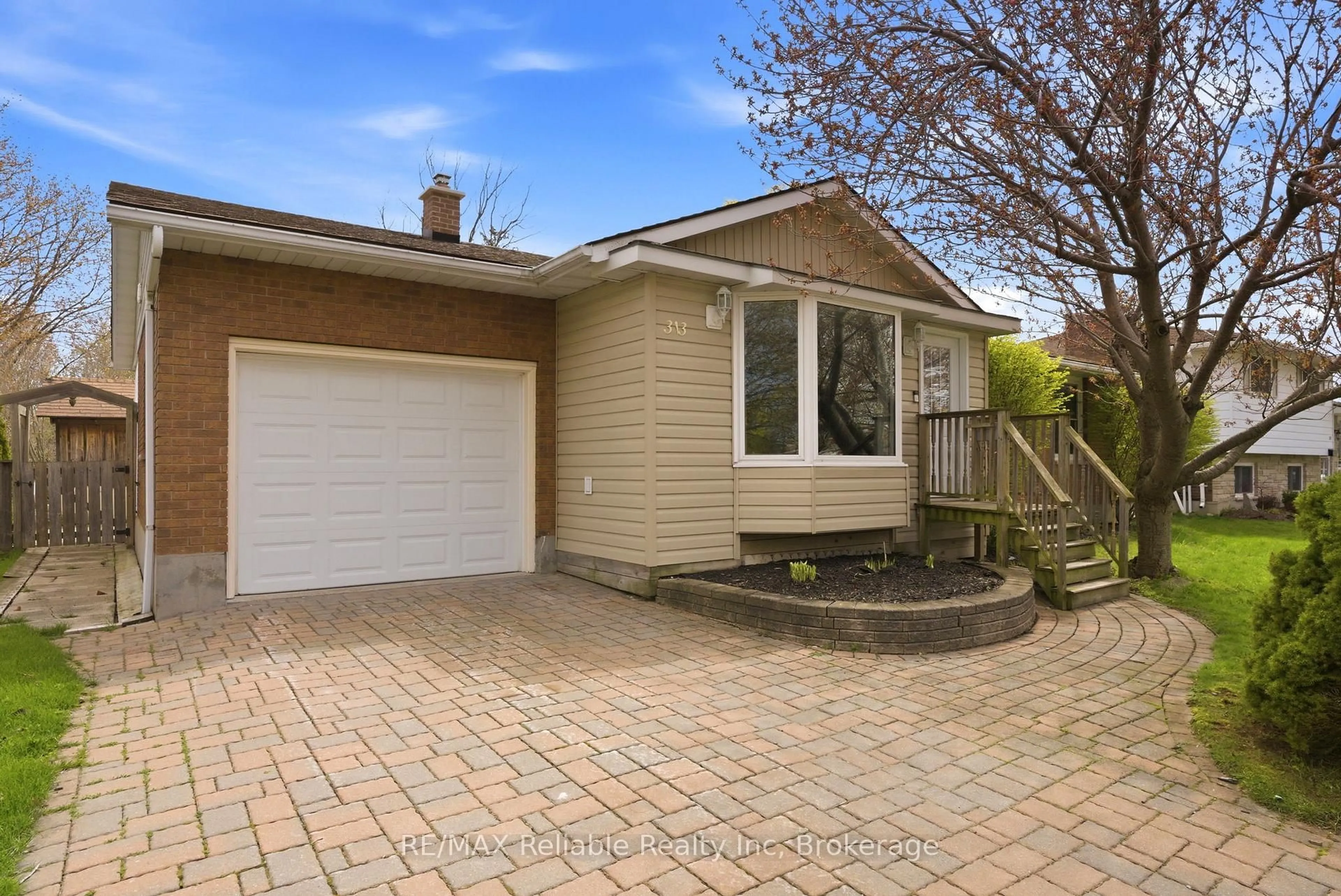 Home with brick exterior material, street for 313 Krohmer Dr, Goderich Ontario N7A 4G8