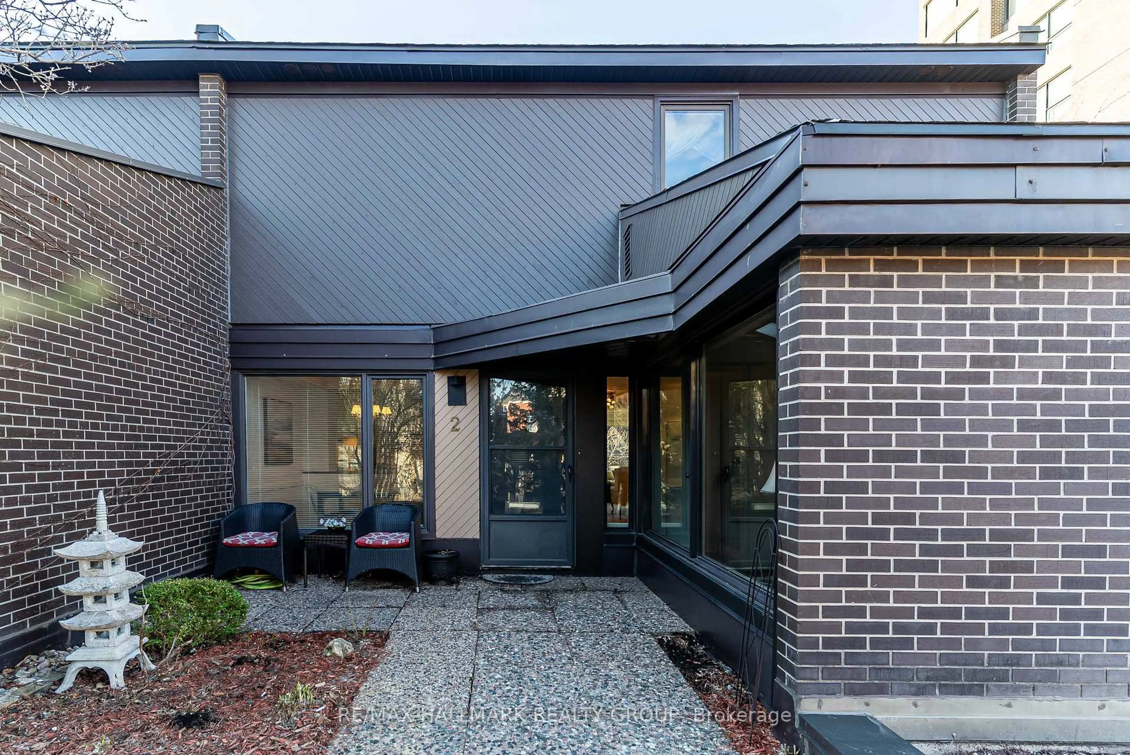 Home with brick exterior material, street for 300 Queen Elizabeth Dr #TH2, Ottawa Ontario K1S 3M6