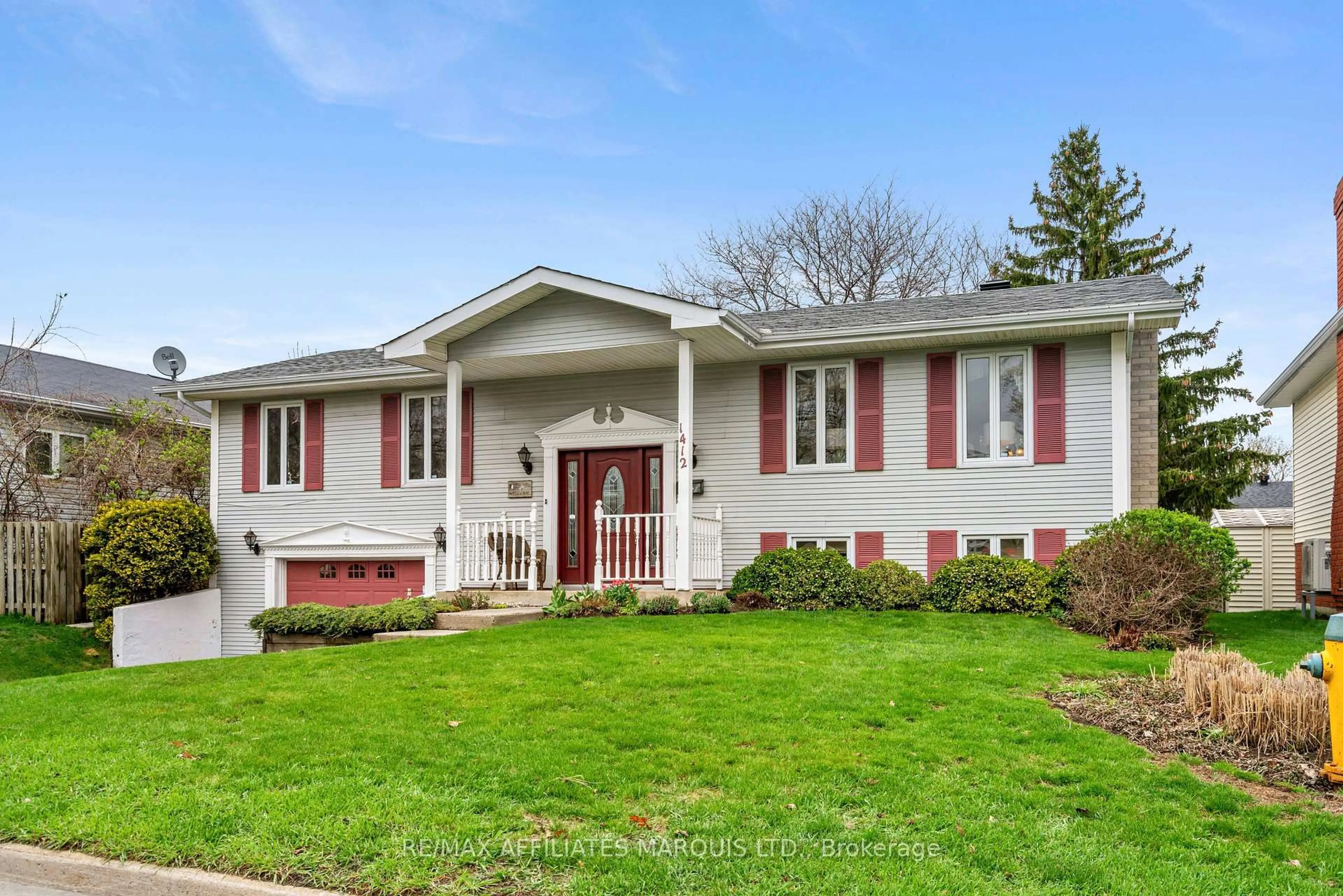 Home with vinyl exterior material, street for 1412 Lochiel St, Cornwall Ontario K6H 6N2
