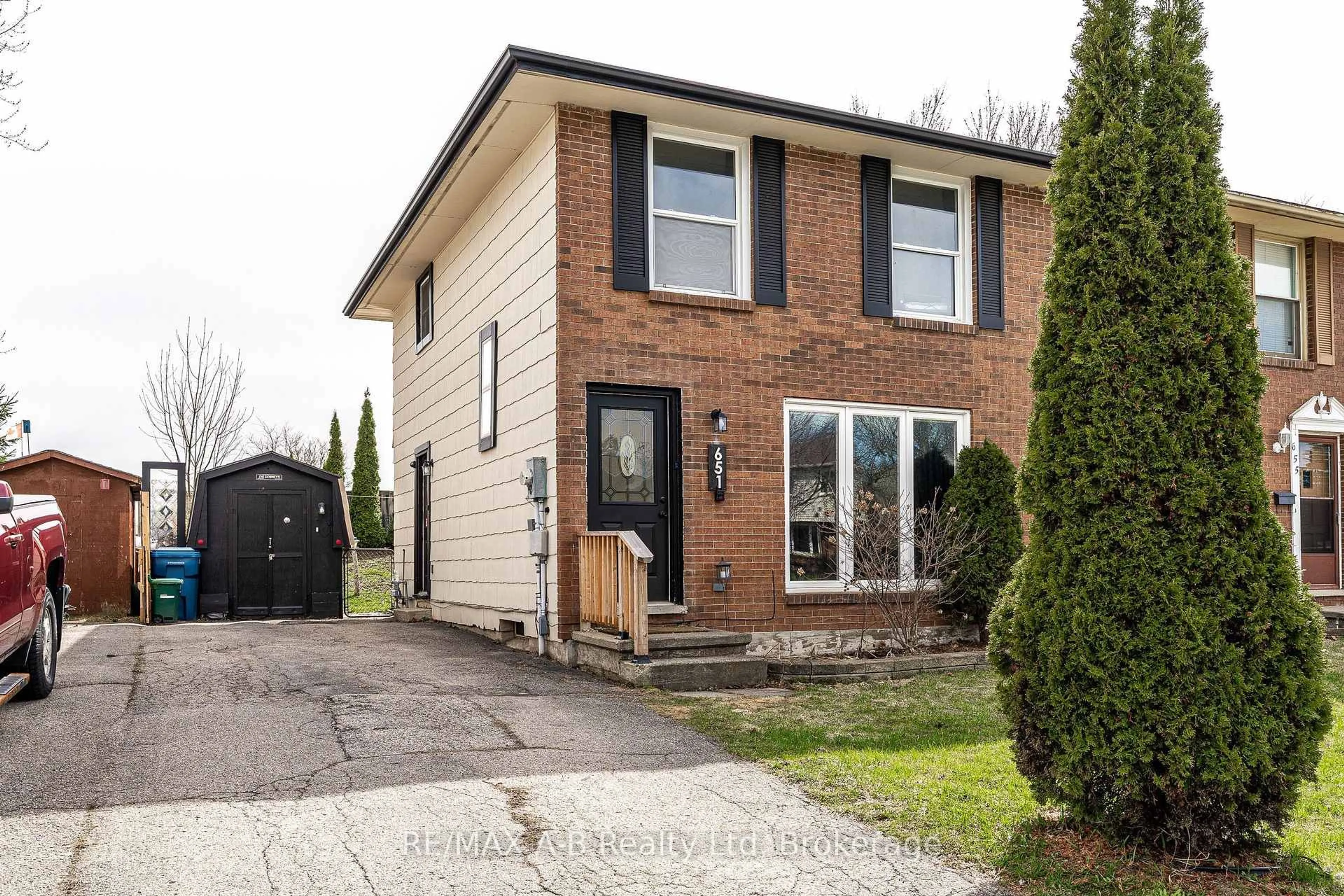 Home with brick exterior material, street for 651 Devon St, Stratford Ontario N4Z 1A5