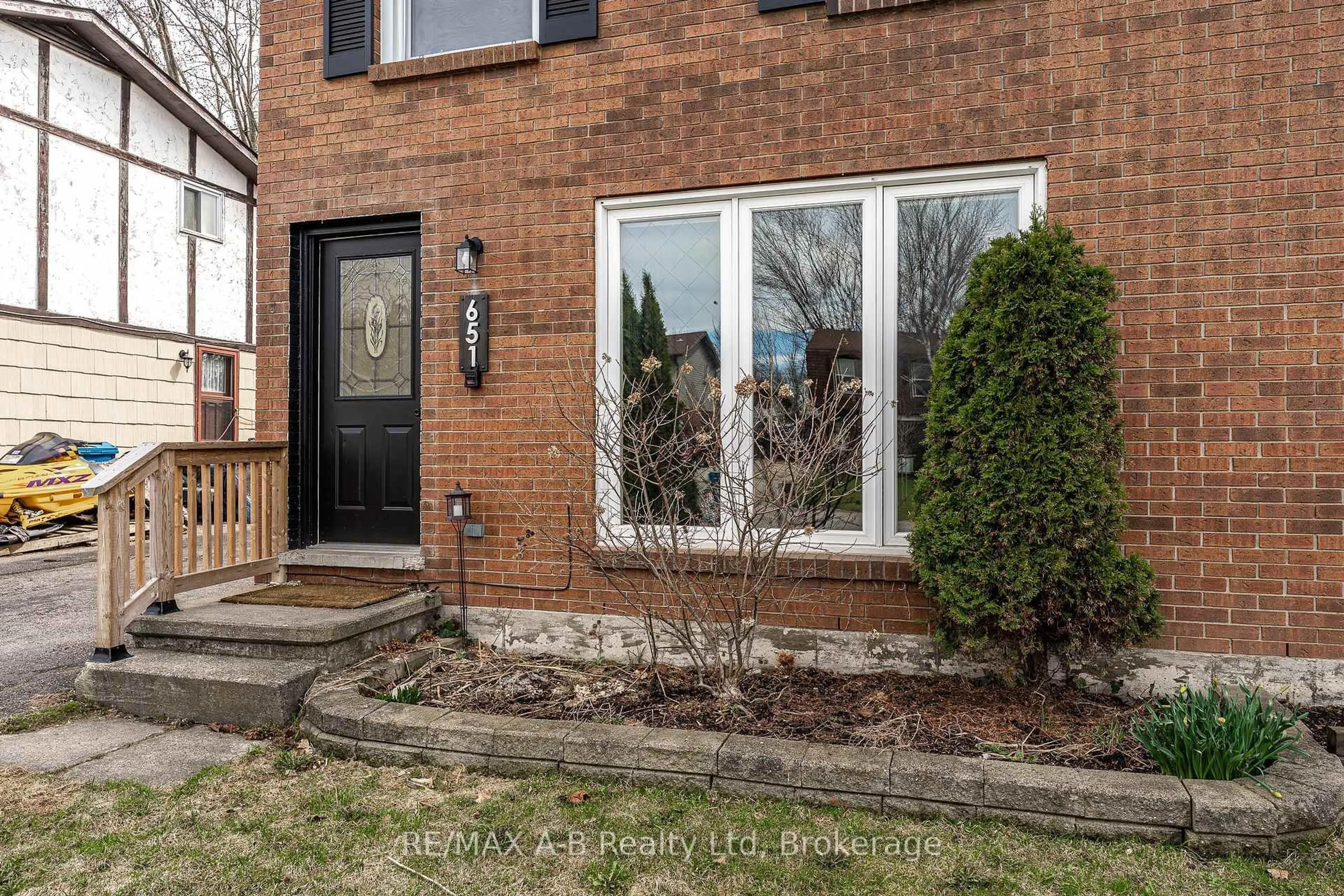 Home with brick exterior material, street for 651 Devon St, Stratford Ontario N4Z 1A5