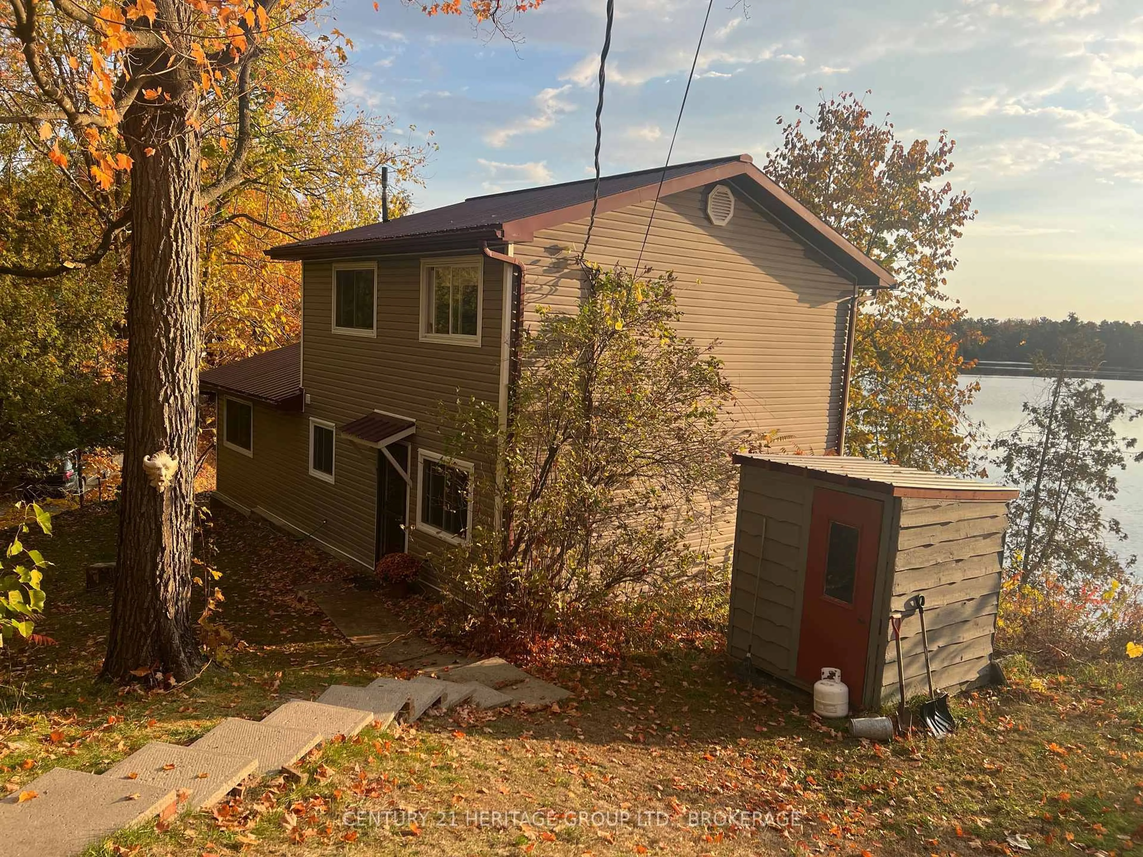A pic from outside/outdoor area/front of a property/back of a property/a pic from drone, water/lake/river/ocean view for 245 Taggart Lane, Rideau Lakes Ontario K0G 1X0