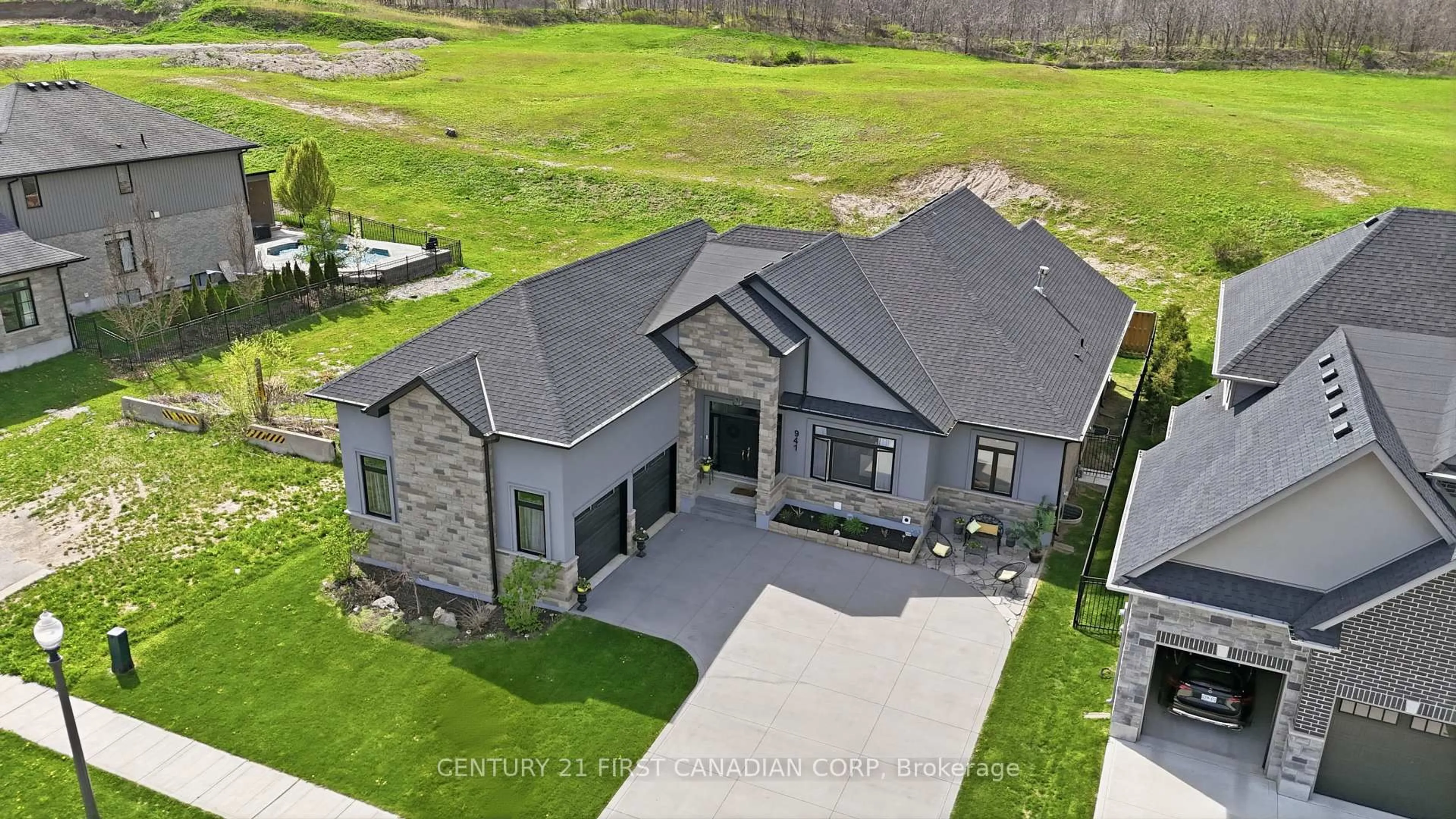 A pic from outside/outdoor area/front of a property/back of a property/a pic from drone, unknown for 941 Longworth Rd, London South Ontario N6K 0C9