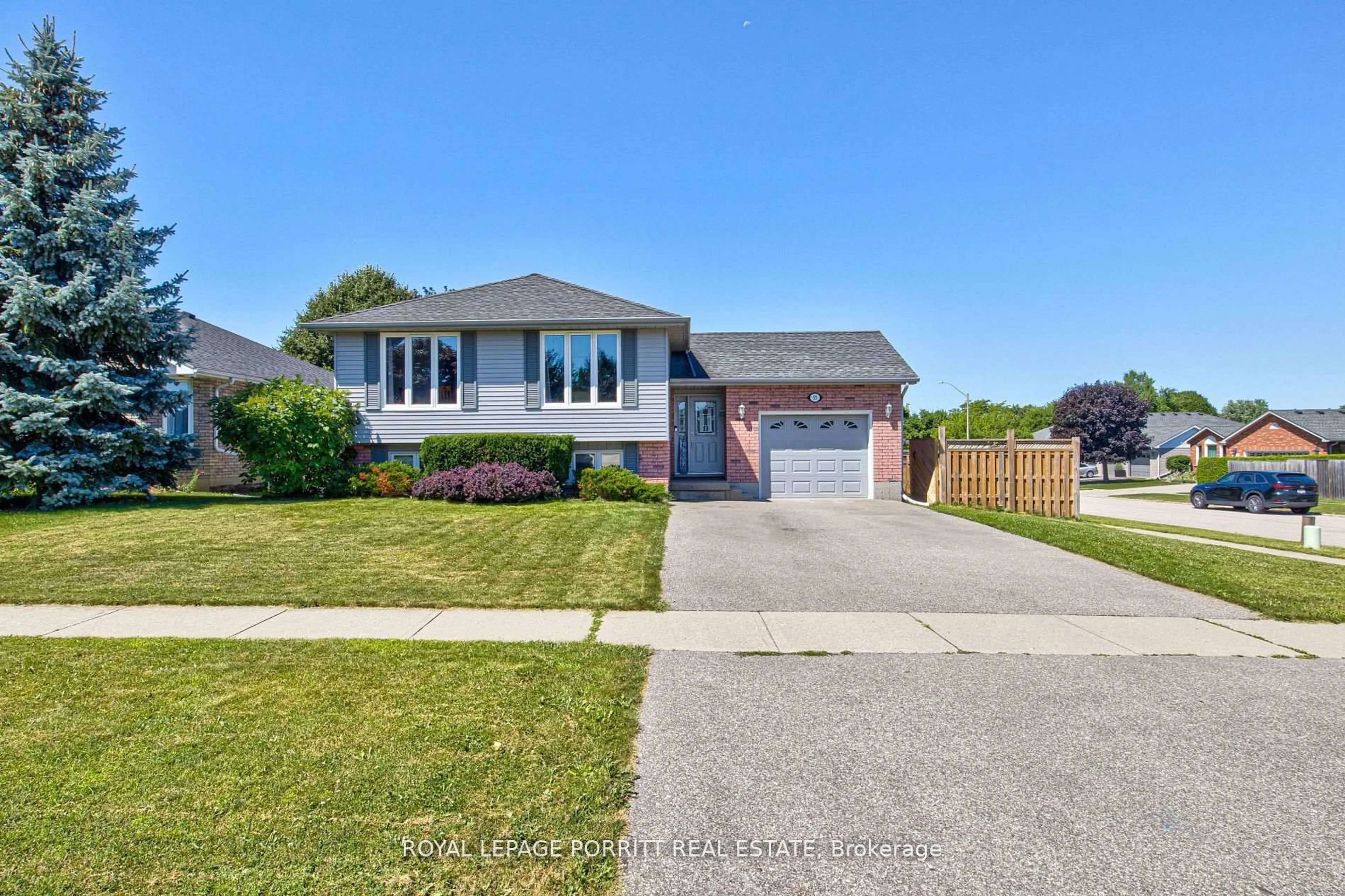 Home with vinyl exterior material, street for 55 Windsor Dr, Brant Ontario N0E 1N0