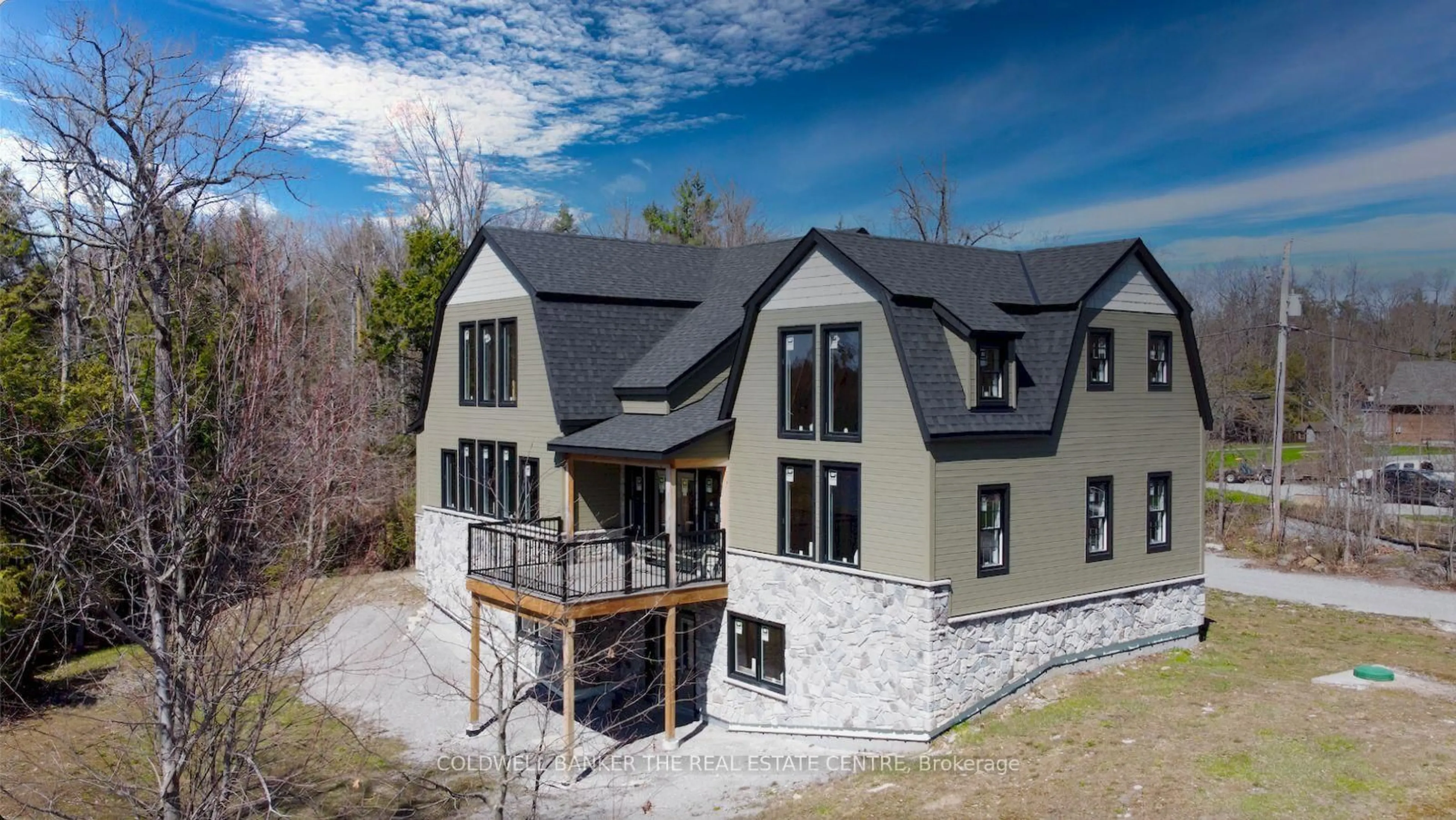 A pic from outside/outdoor area/front of a property/back of a property/a pic from drone, unknown for 16 Evergreen Way, Trent Lakes Ontario K0M 1A0