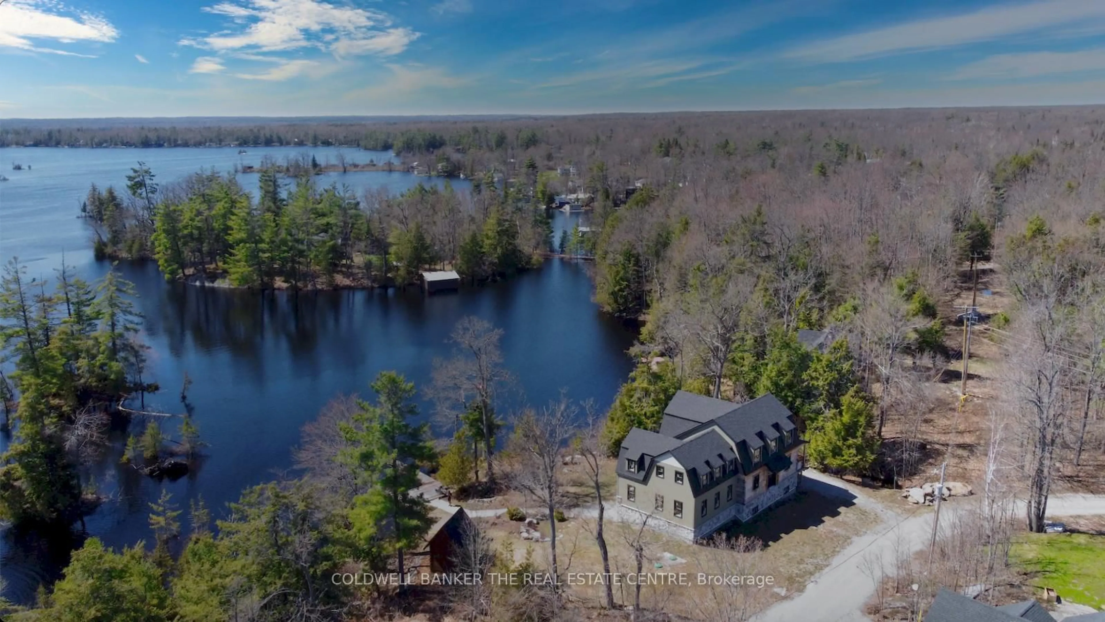 A pic from outside/outdoor area/front of a property/back of a property/a pic from drone, water/lake/river/ocean view for 16 Evergreen Way, Trent Lakes Ontario K0M 1A0