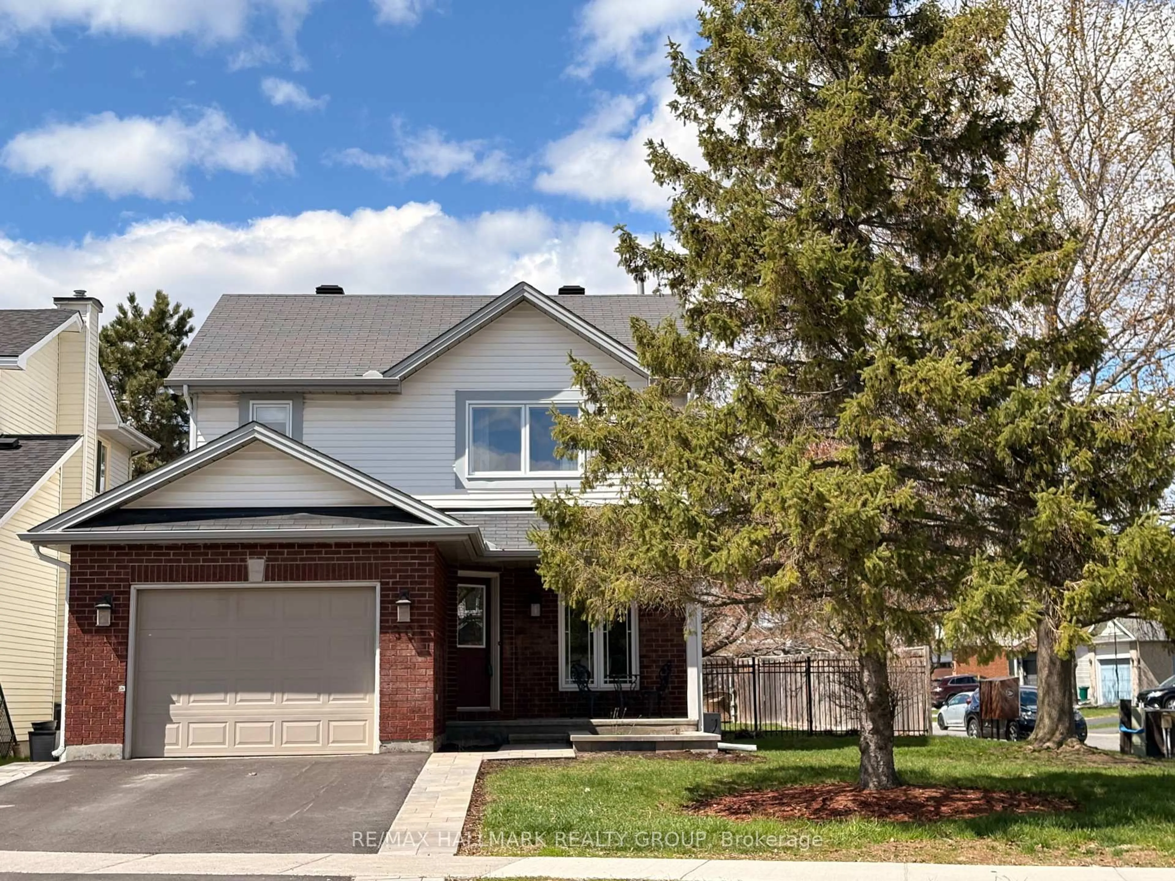 Home with brick exterior material, street for 301 Tompkins Ave, Ottawa Ontario K1E 3X3