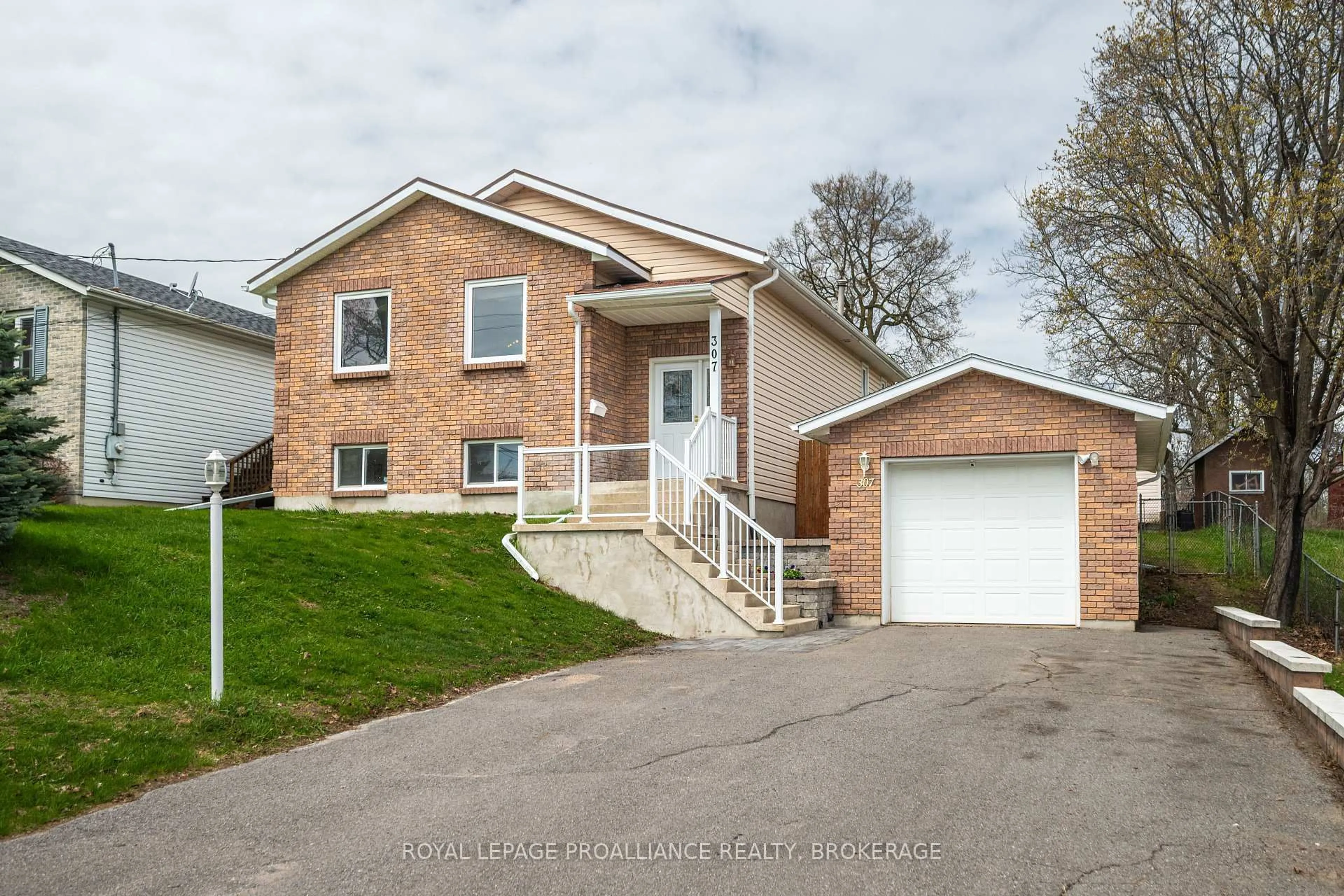 Home with brick exterior material, street for 307 Amherst Dr, Loyalist Ontario K7N 1V3