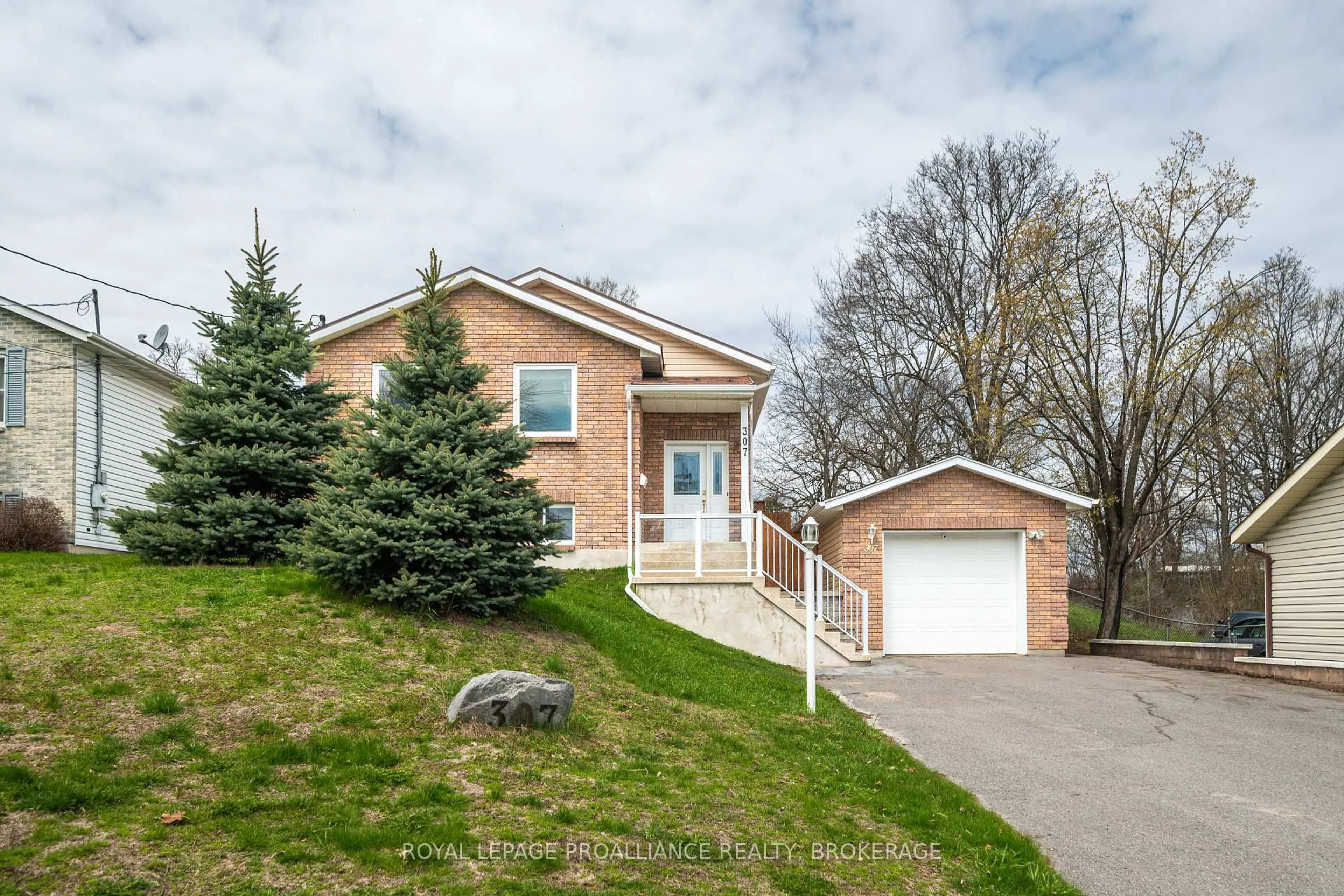 Home with brick exterior material, street for 307 Amherst Dr, Loyalist Ontario K7N 1V3