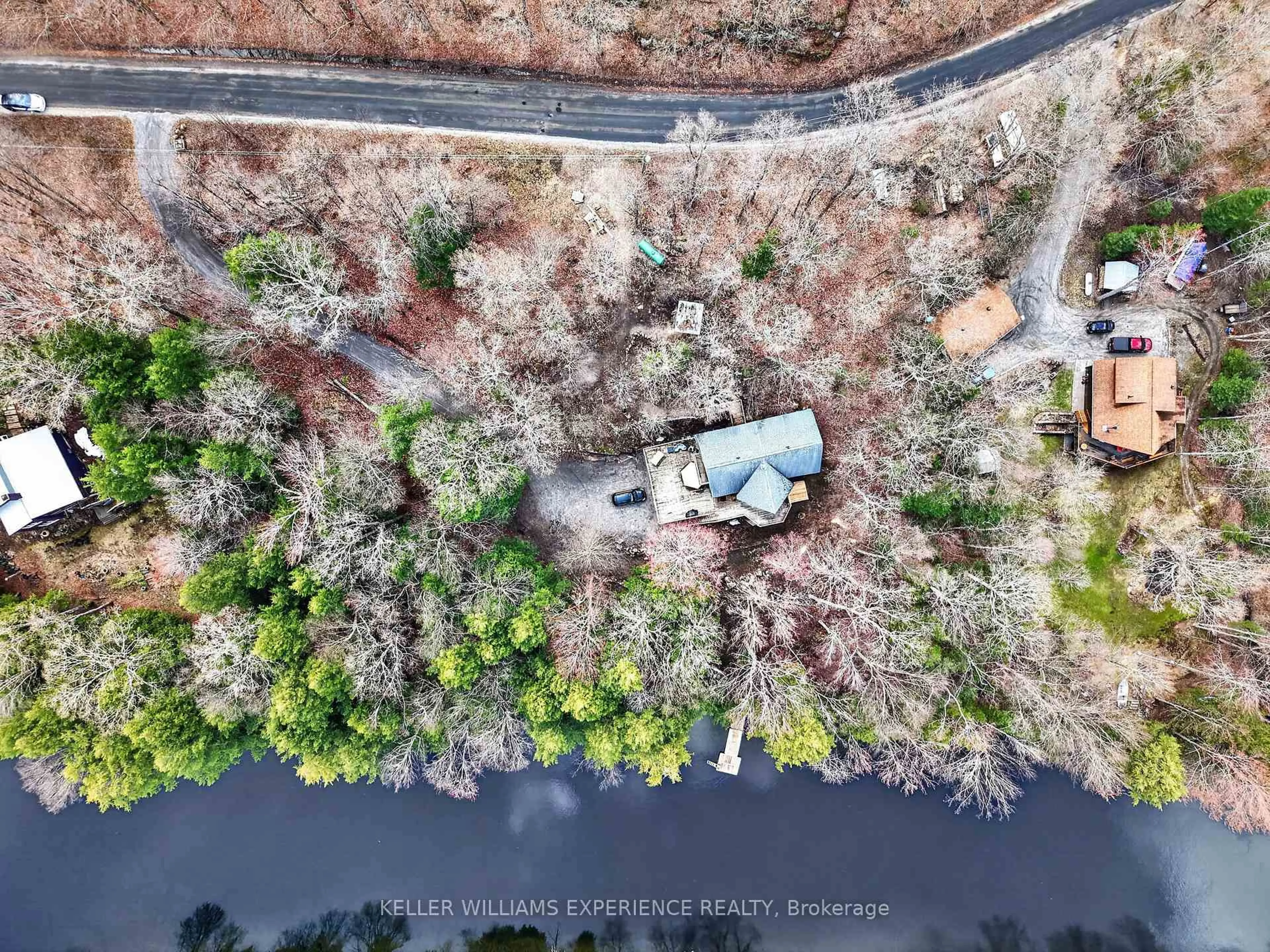 A pic from outside/outdoor area/front of a property/back of a property/a pic from drone, water/lake/river/ocean view for 1115 Sherwood Forest Rd, Bracebridge Ontario P1L 1X3