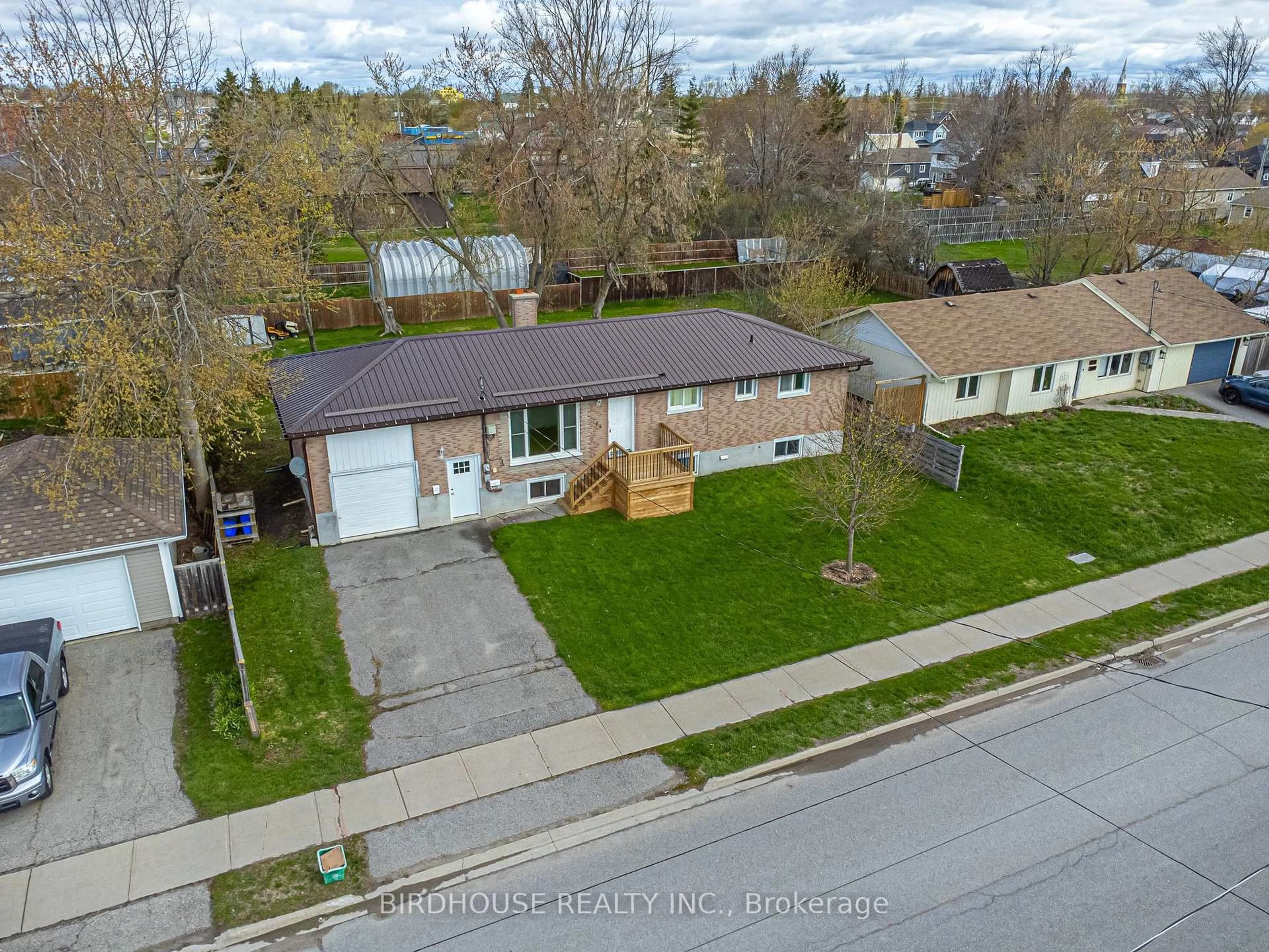 A pic from outside/outdoor area/front of a property/back of a property/a pic from drone, street for 64 George St, Kawartha Lakes Ontario K9V 5H9
