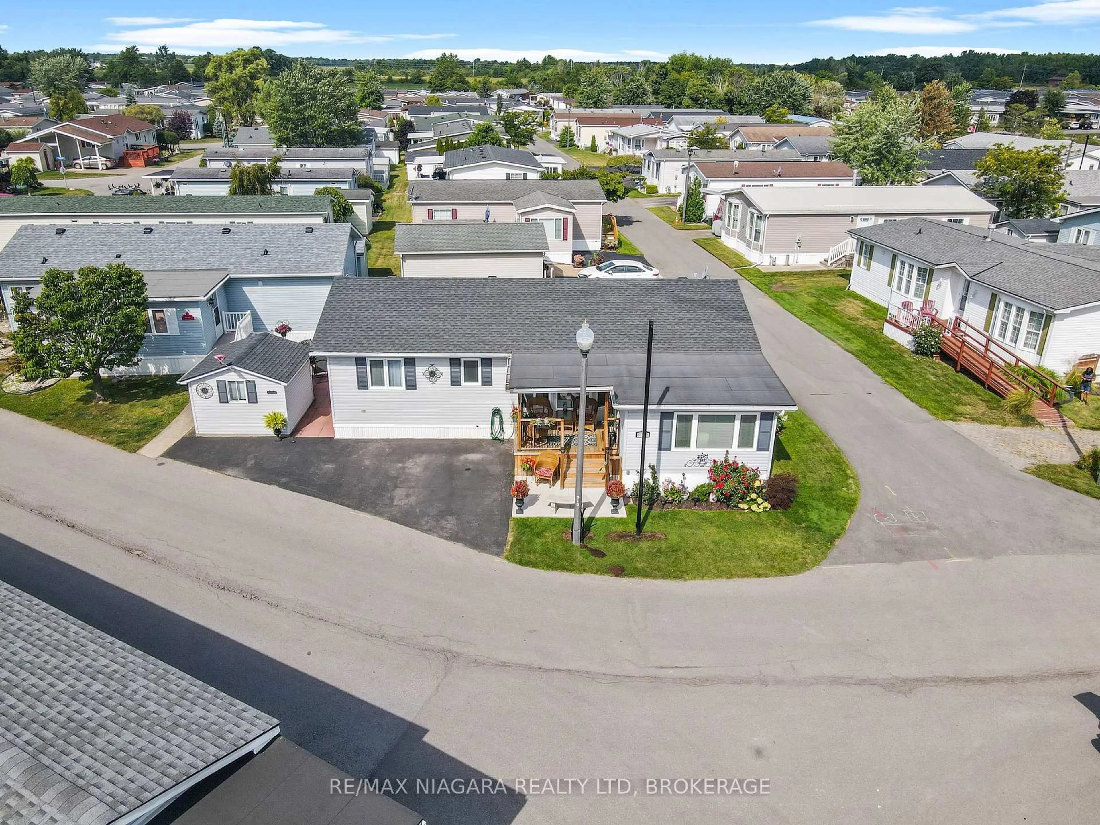 A pic from outside/outdoor area/front of a property/back of a property/a pic from drone, street for 3033 Townline Rd #317, Fort Erie Ontario L0S 1S1