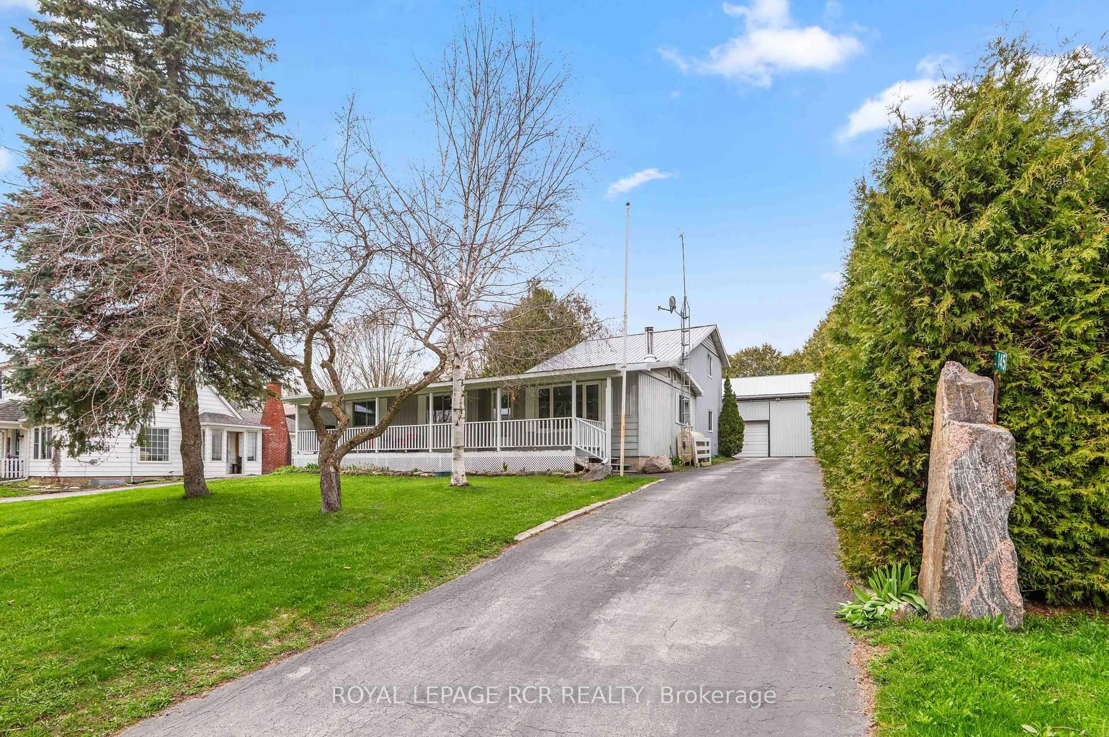 A pic from outside/outdoor area/front of a property/back of a property/a pic from drone, street for 145 River Rd, Grey Highlands Ontario N0C 1C0