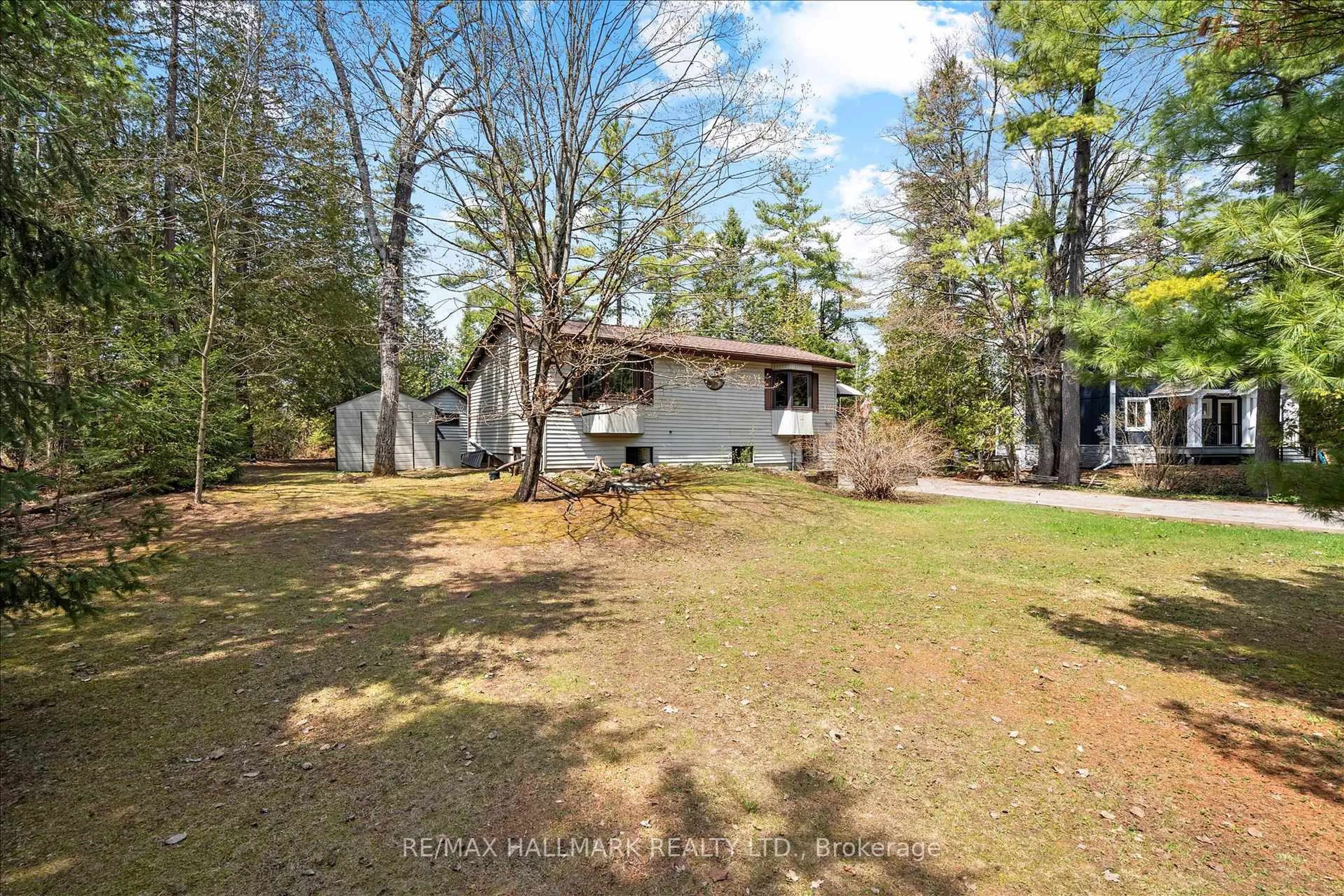 A pic from outside/outdoor area/front of a property/back of a property/a pic from drone, unknown for 25 Little Silver Lake Way, Trent Lakes Ontario K0M 1A0